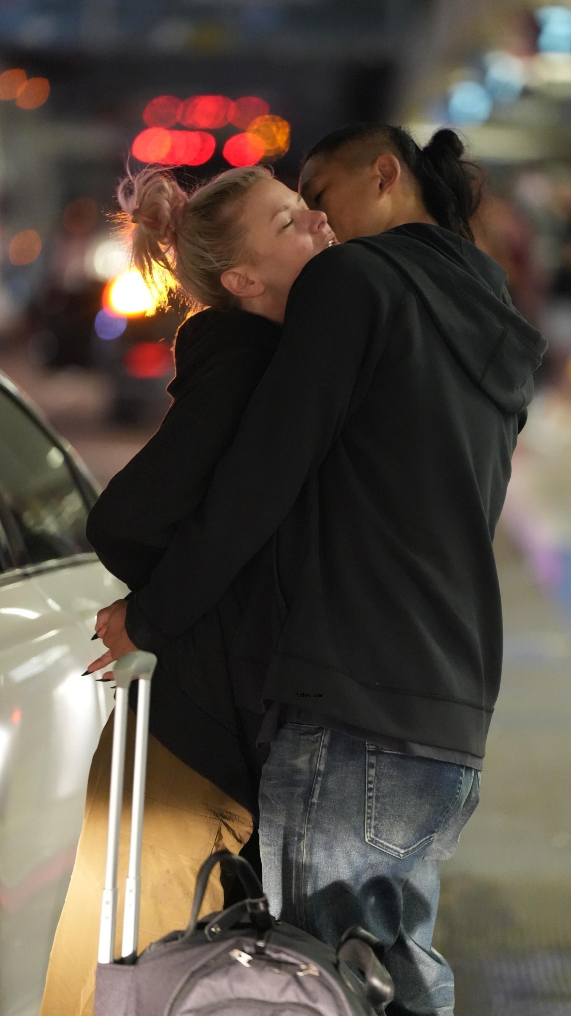 Ariana Madix and Daniel Wai kissing.