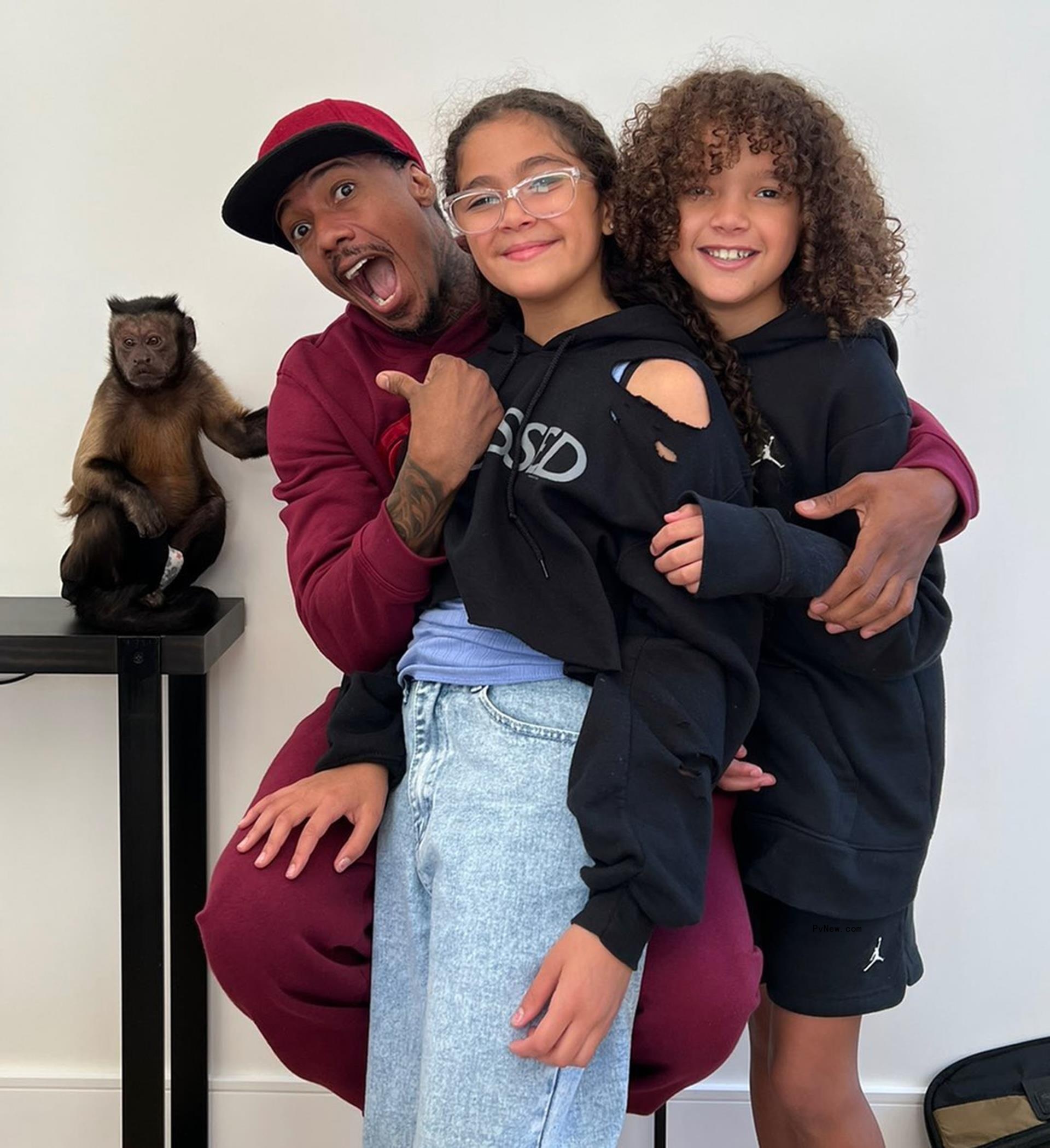 Nick Cannon poses with Moroccan and Monroe