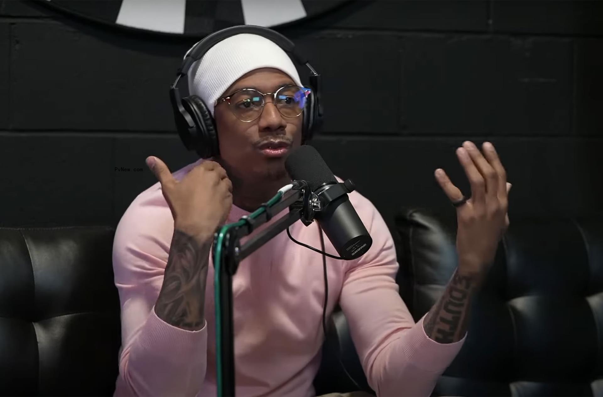 Nick Cannon talks into mic