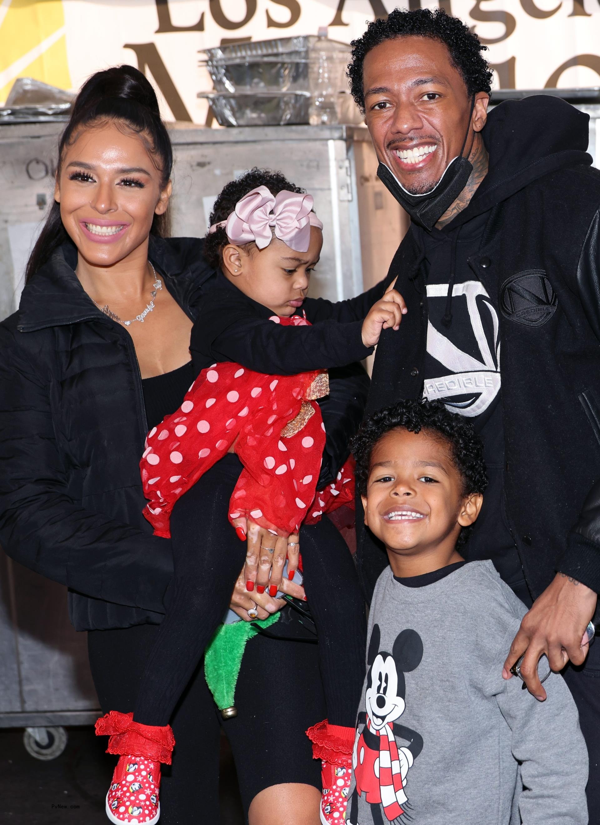 Nick Cannon and Brittany Bell smile with Golden and Powerful