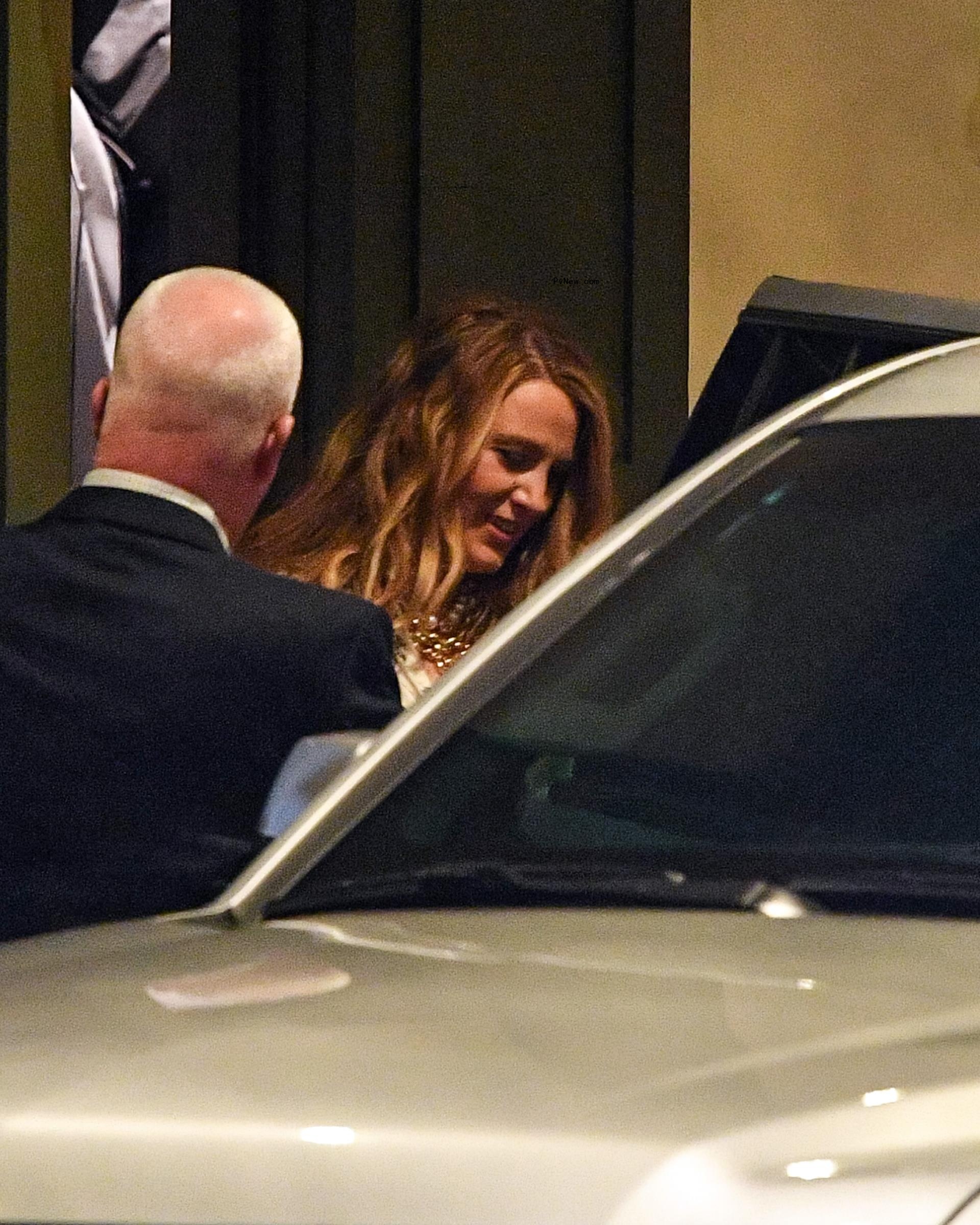 Blake Lively getting into a white car