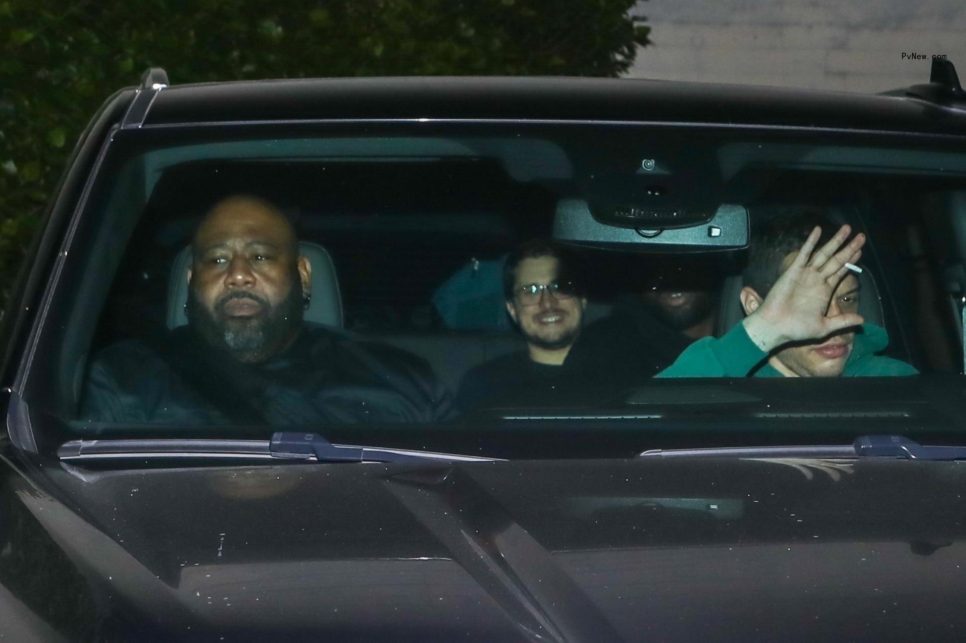 Pete Davidson driving people in his car