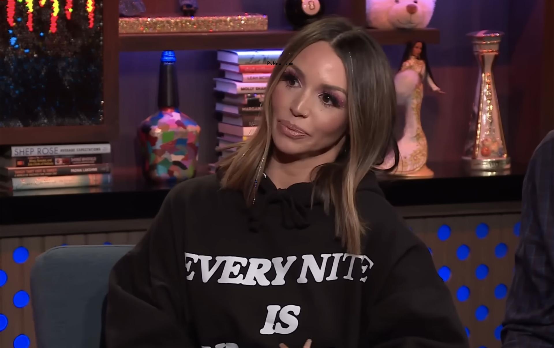 Scheana Shay sits in sweatshirt on