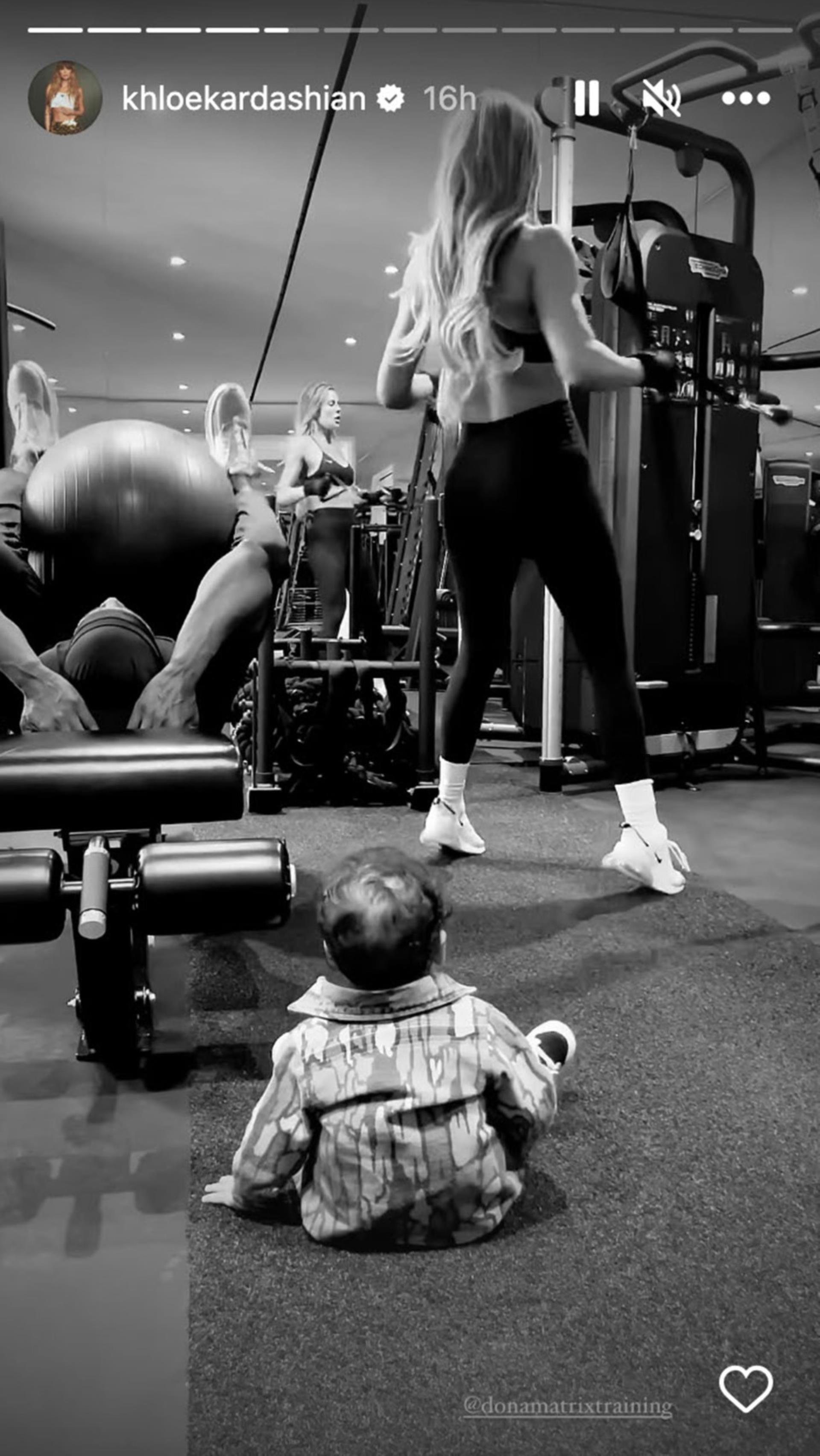 Khloé Kardashian works out while son watchs
