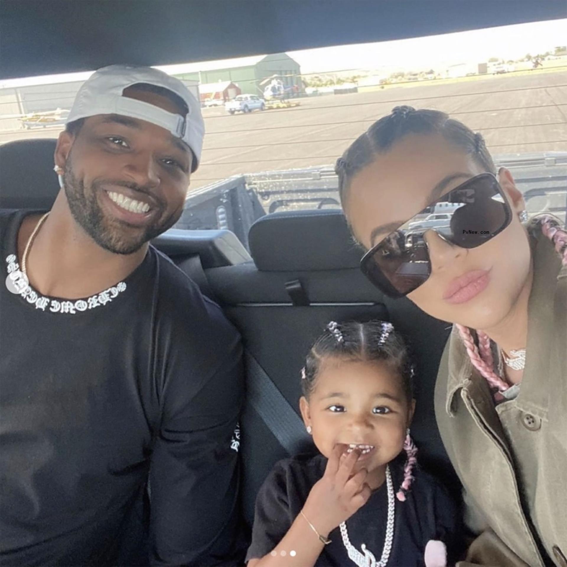 Khloé Kardashian and Tristan Thompson with True in a selfie.