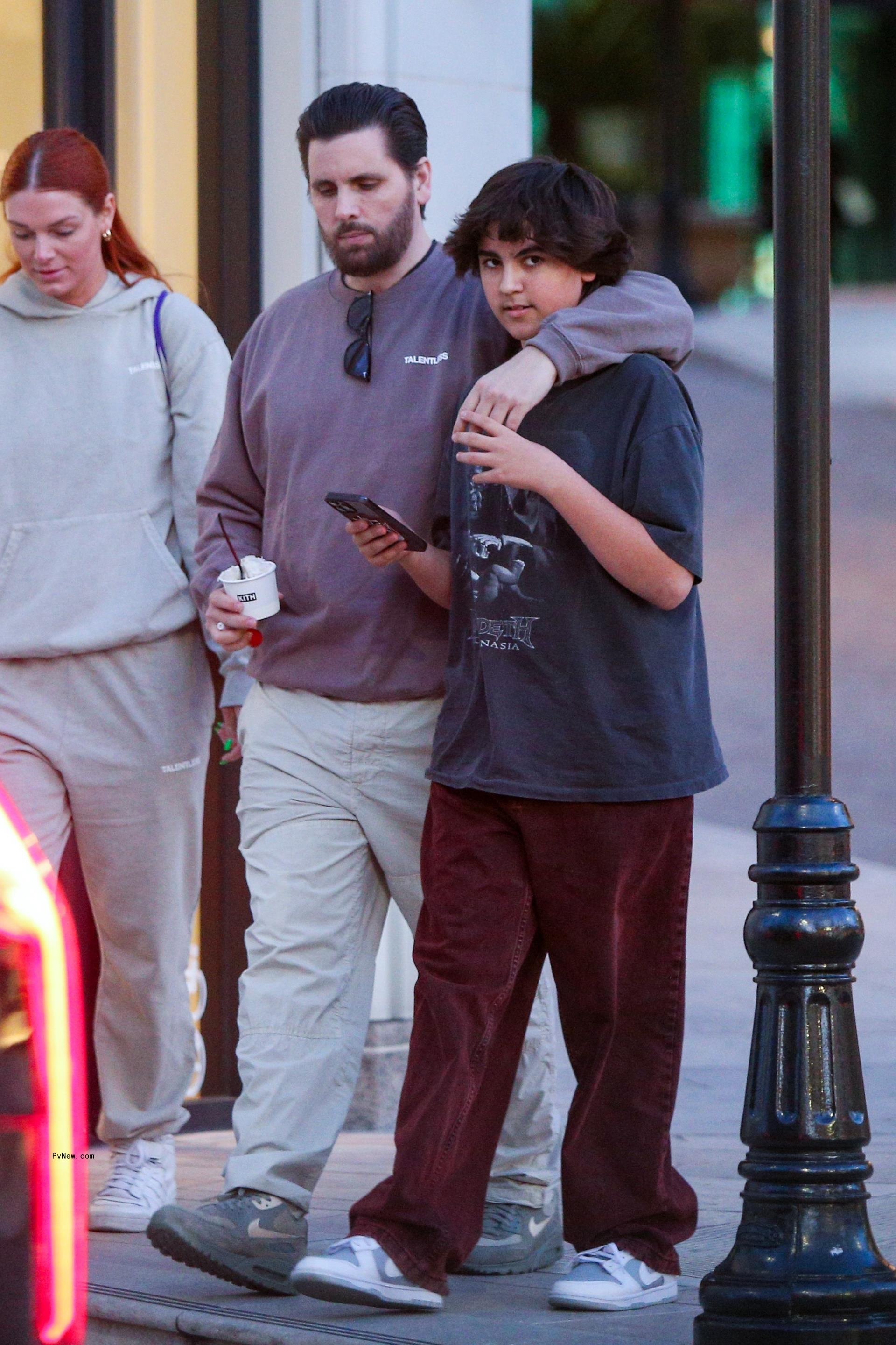 Mason Disick and Scott Disick walking together 