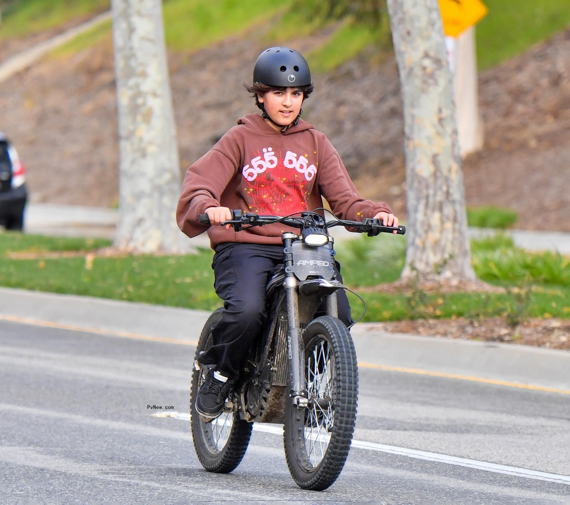 Mason Disick riding a motorbike