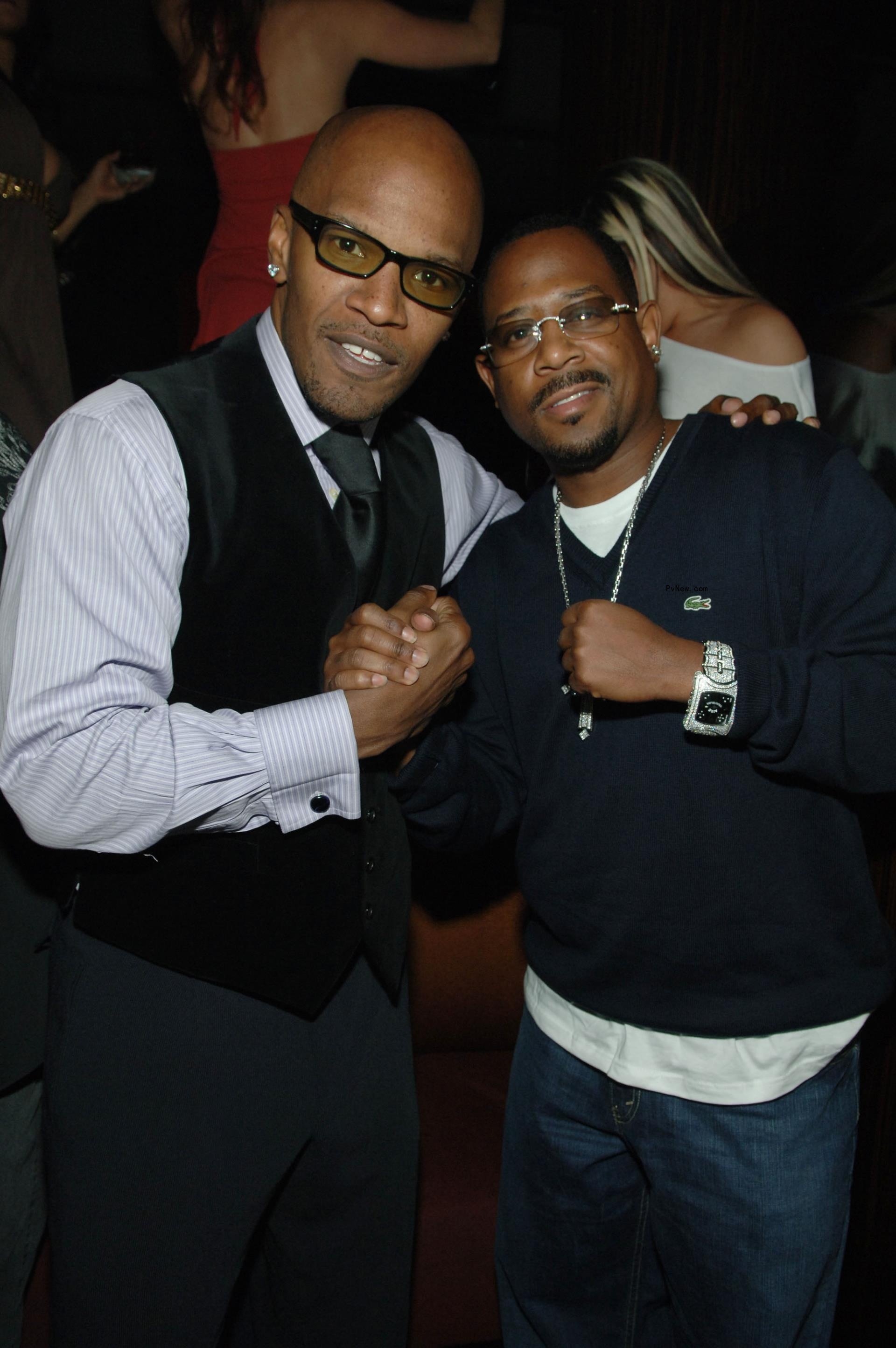 Martin Lawrence and Jamie Foxx shake hands