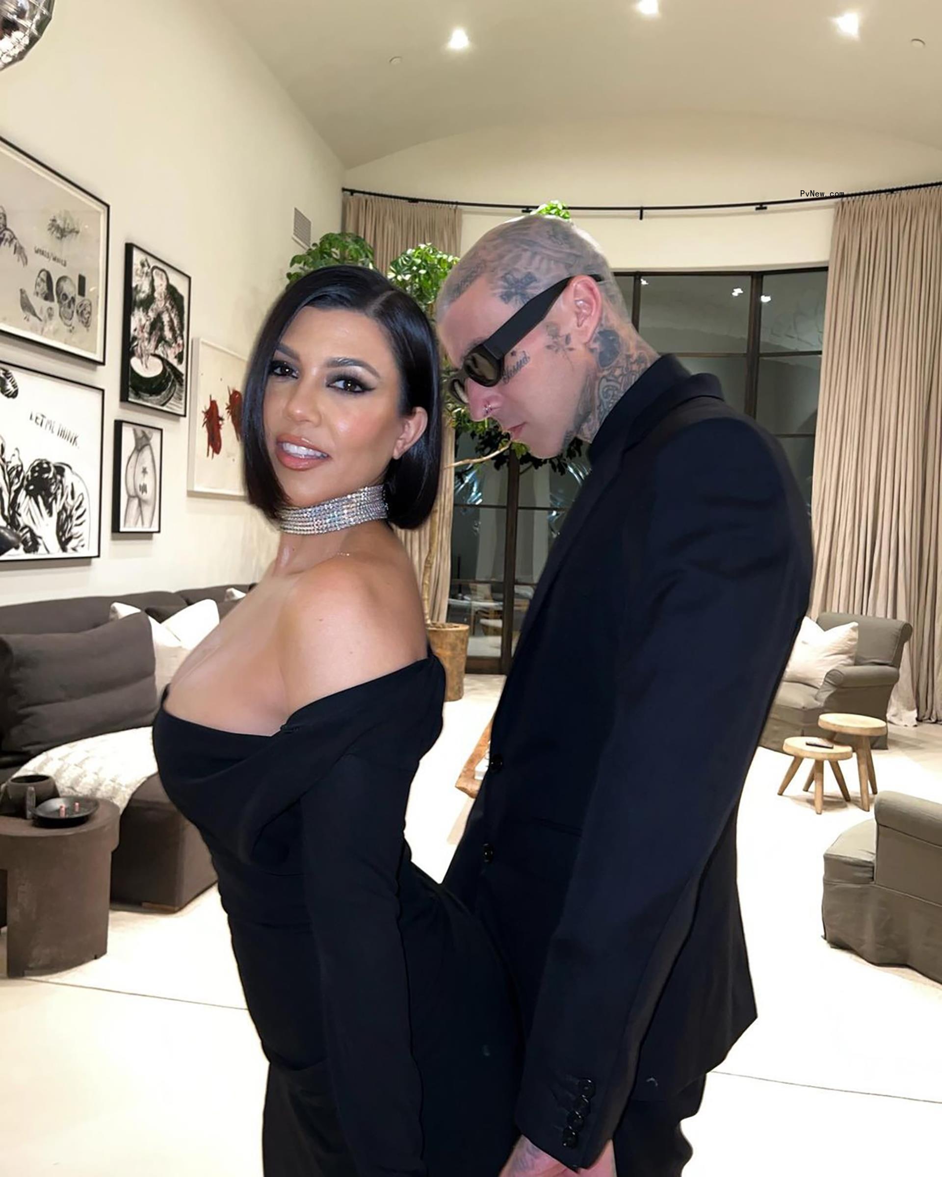 Travis Barker and Kourtney Kardashian in their house