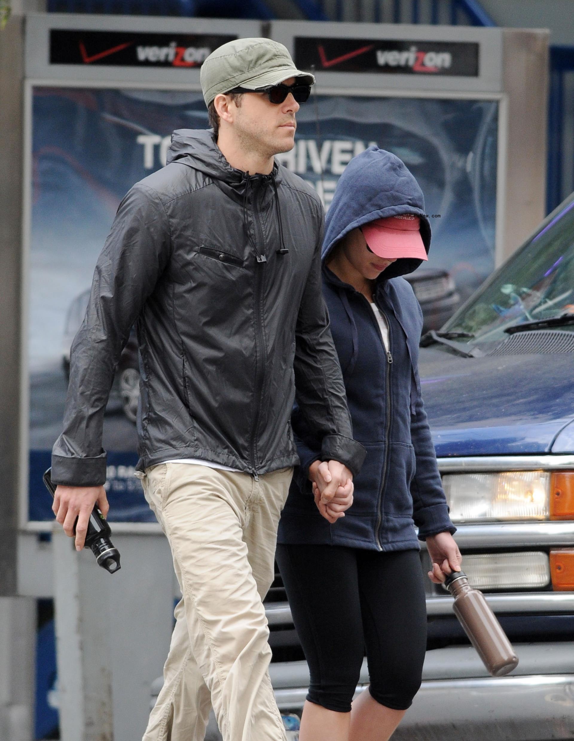 Ryan Reynolds and Scarlett Johansson hold hands as they leave the gym together 