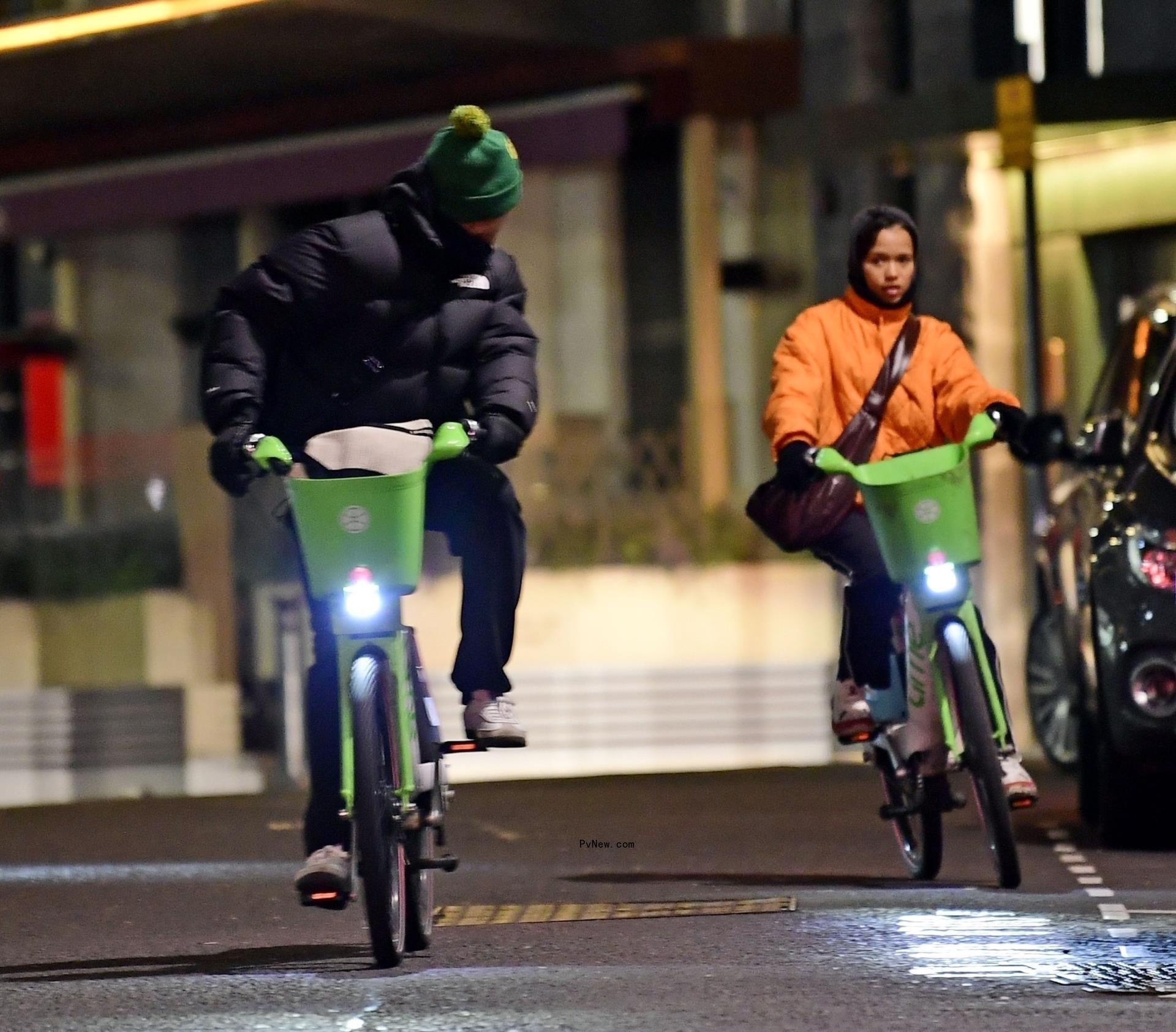Harry Styles and Taylor Russell biking together