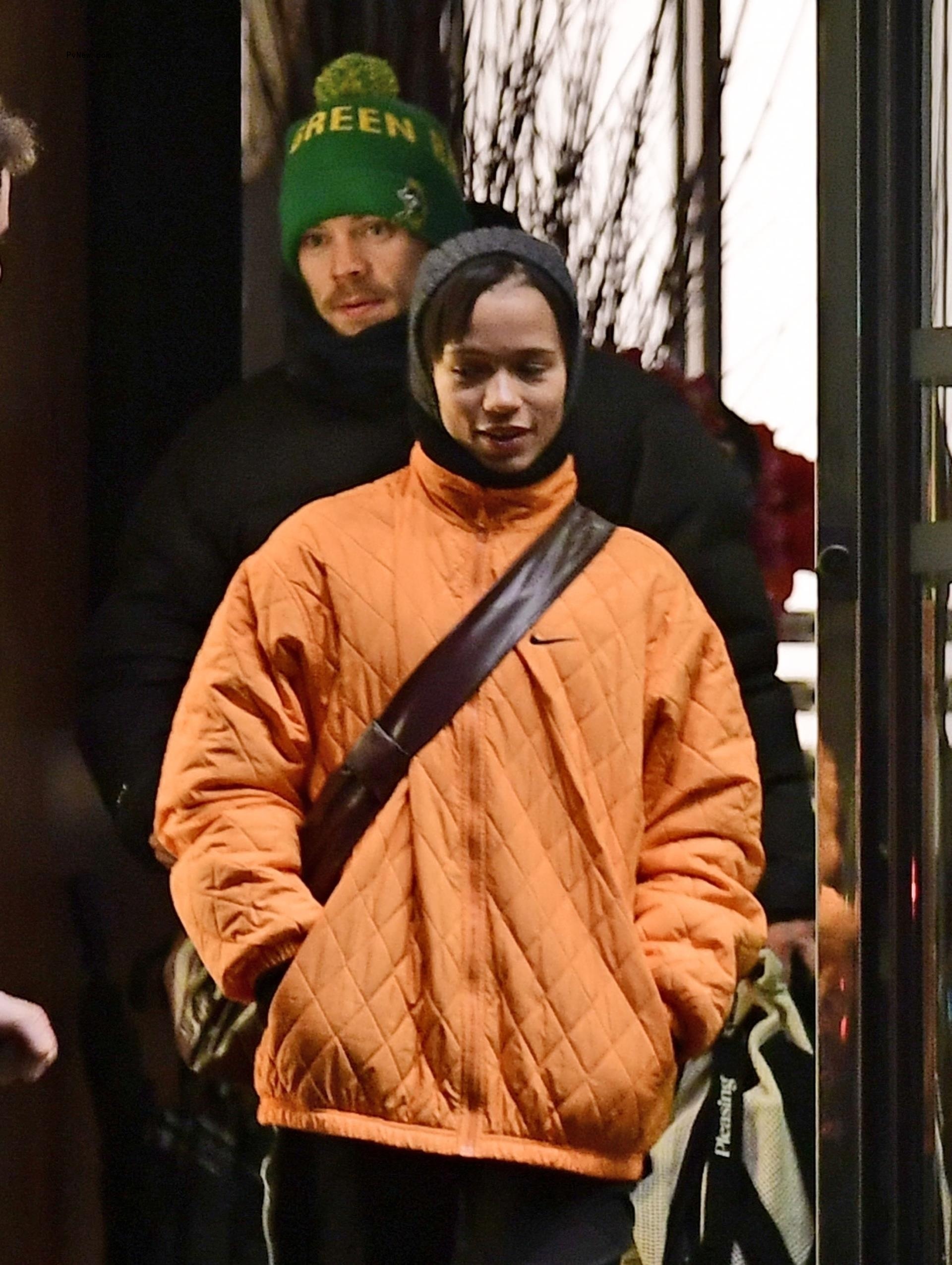Harry Styles and Taylor Russell walking together