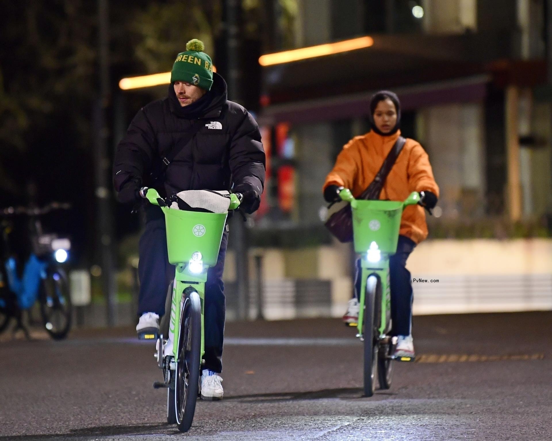 Harry Styles and Taylor Russell biking together