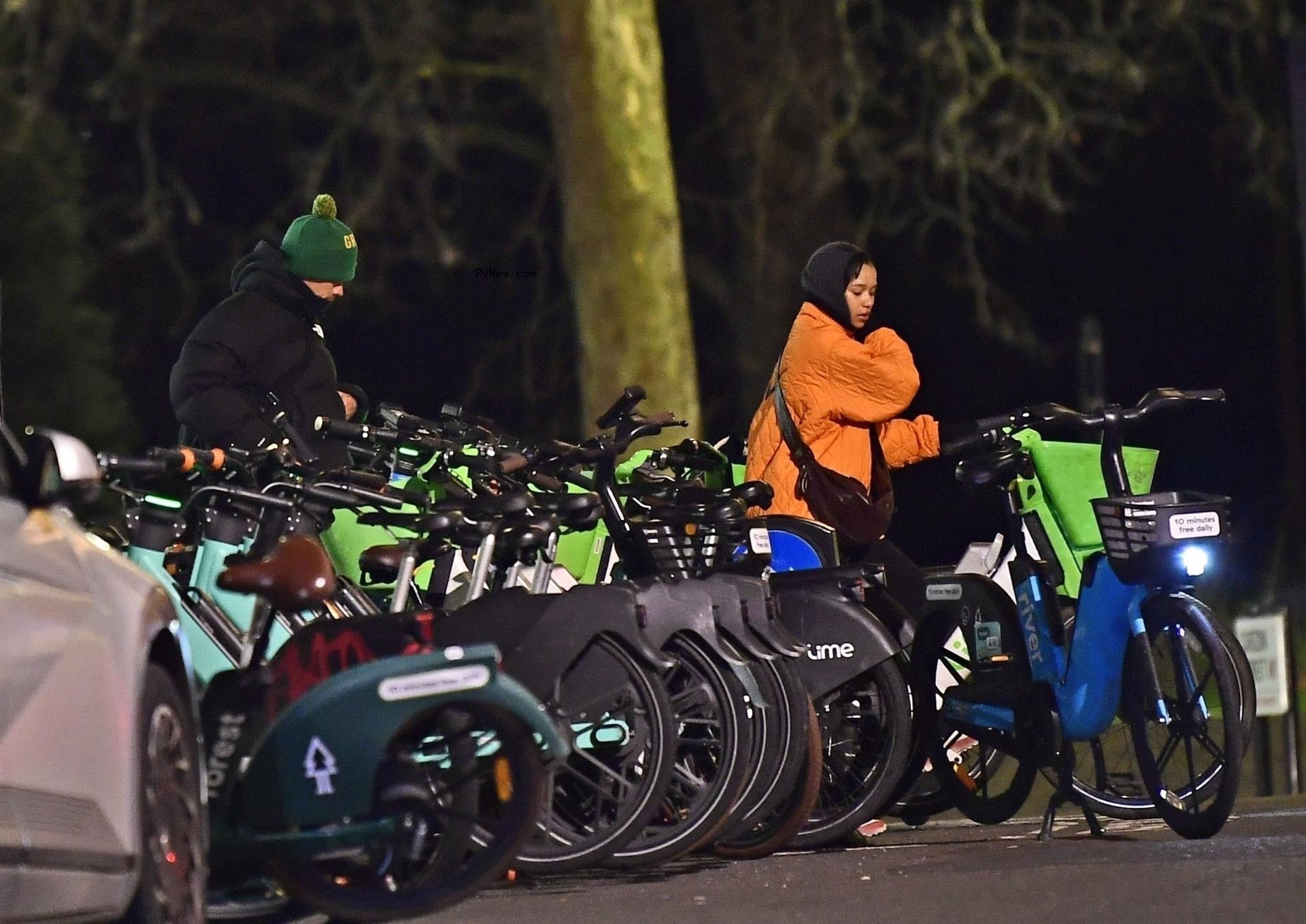 Harry Styles and Taylor Russell picking out bikes