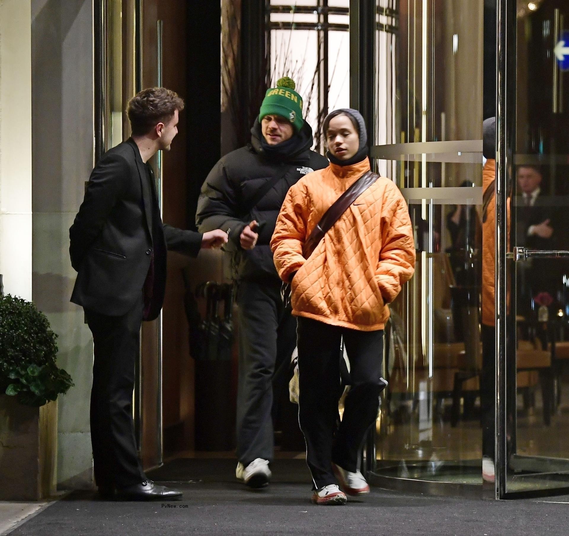 Harry Styles and Taylor Russell walking together