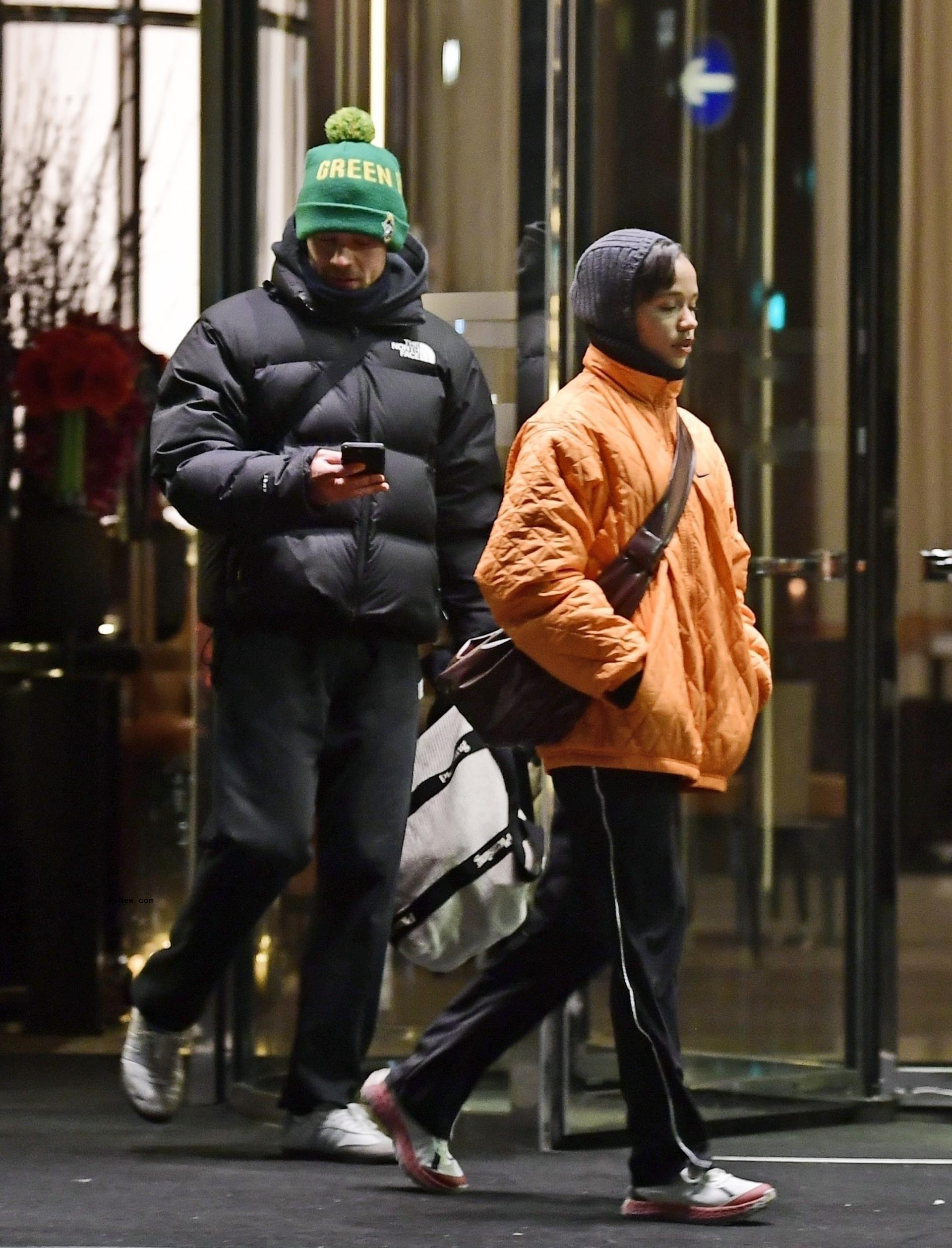 Harry Styles and Taylor Russell walking together