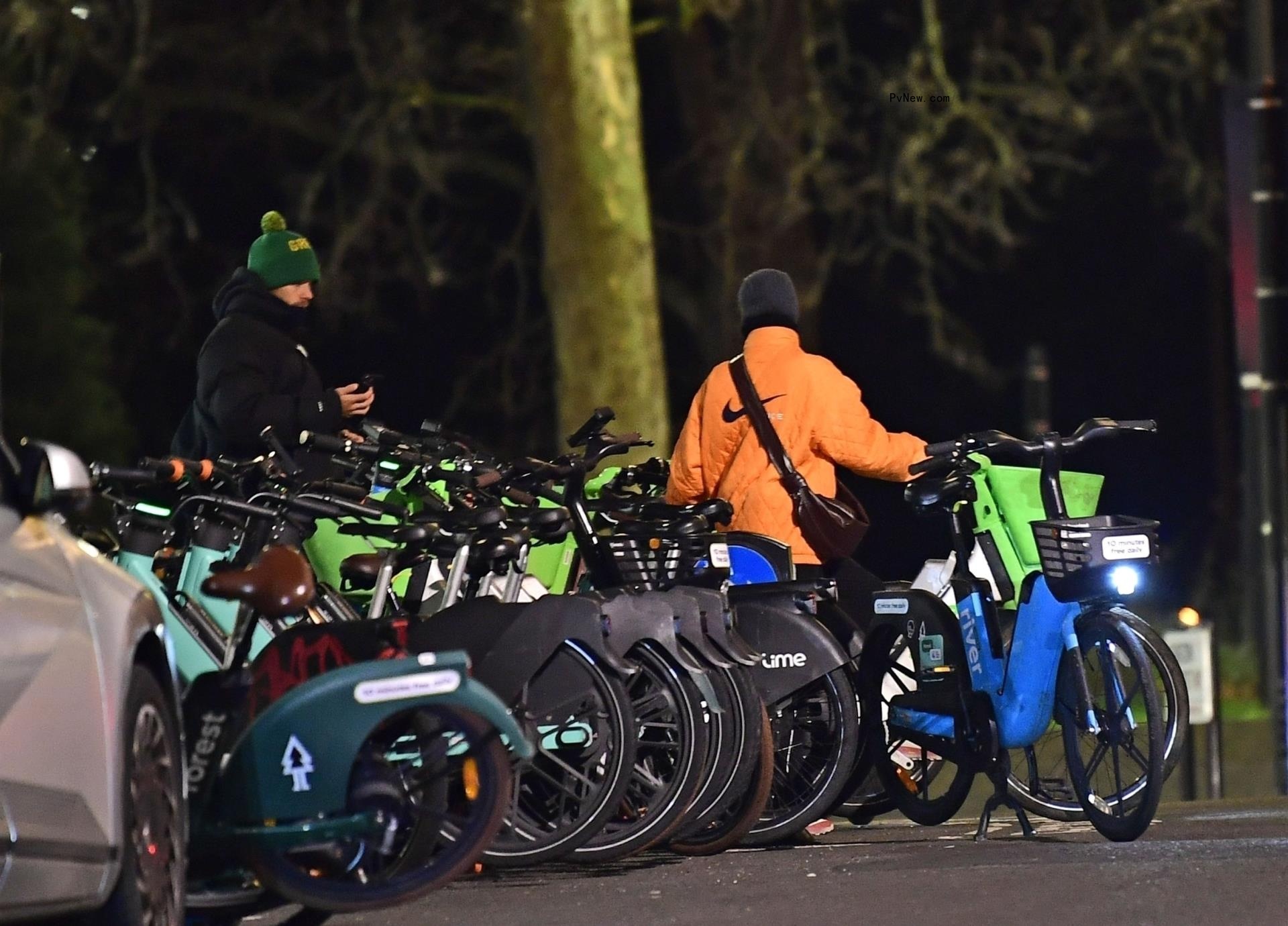 Harry Styles and Taylor Russell picking out bikes