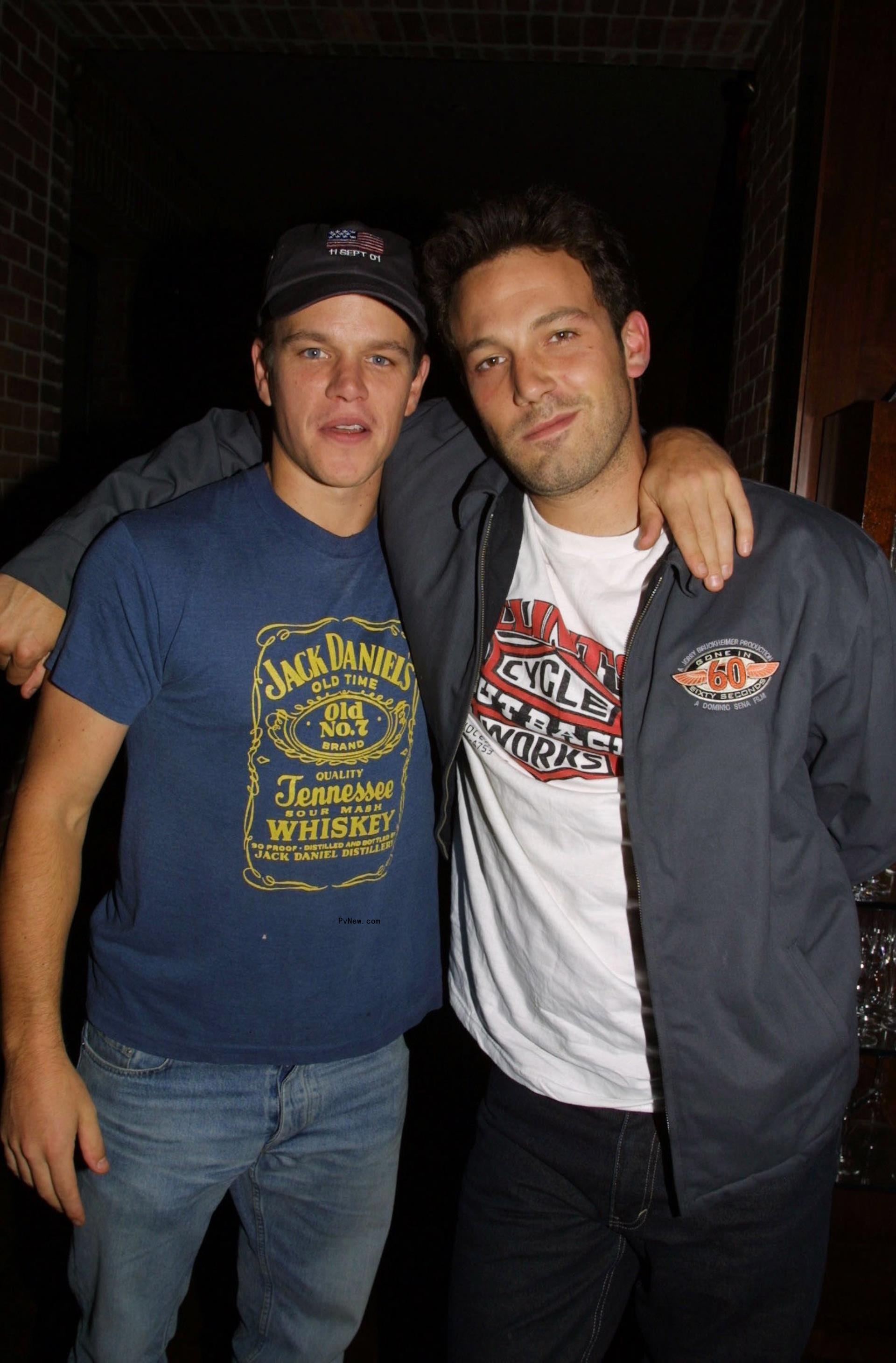 Matt Damon and Ben Affleck posing for a photo together.