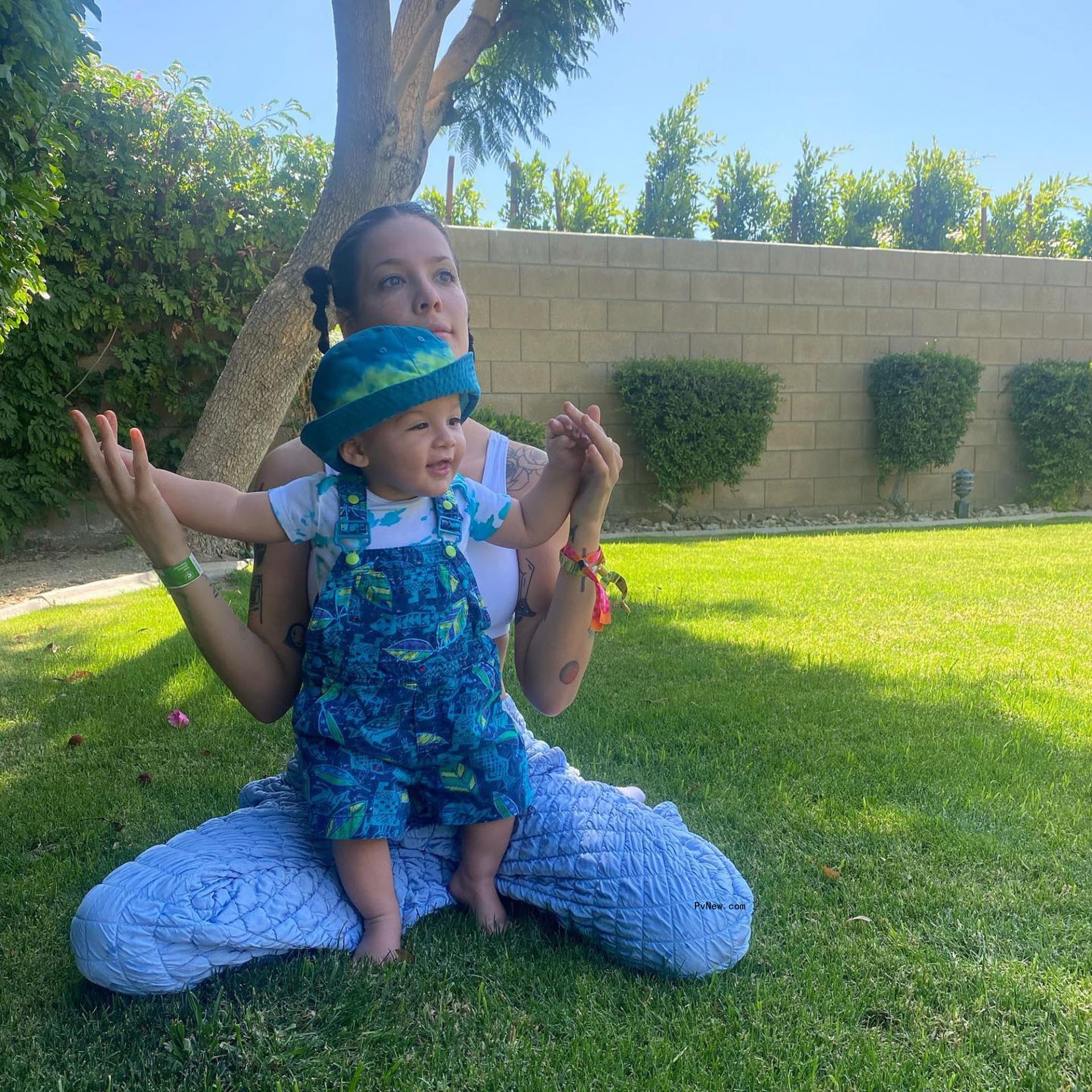 Halsey sits with son Ender