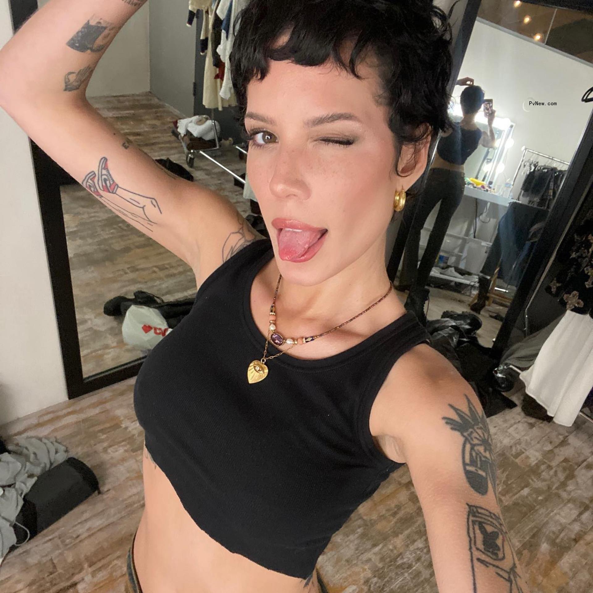 Halsey poses in black tank