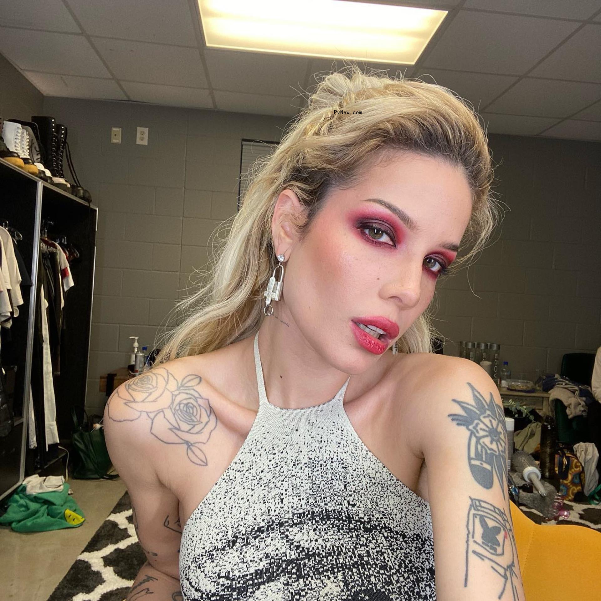 Halsey takes selfie in pink glam
