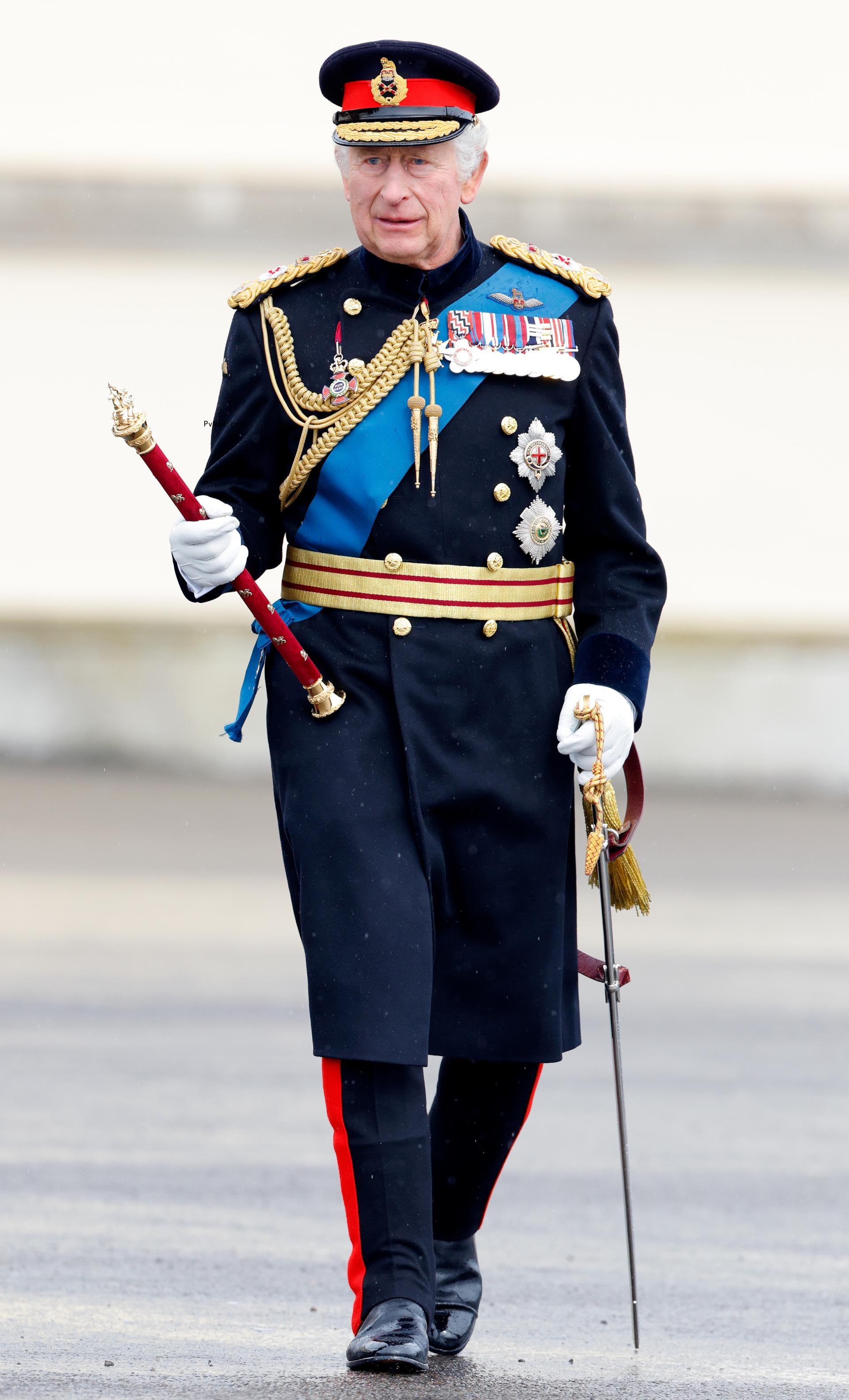 King Charles III walking.