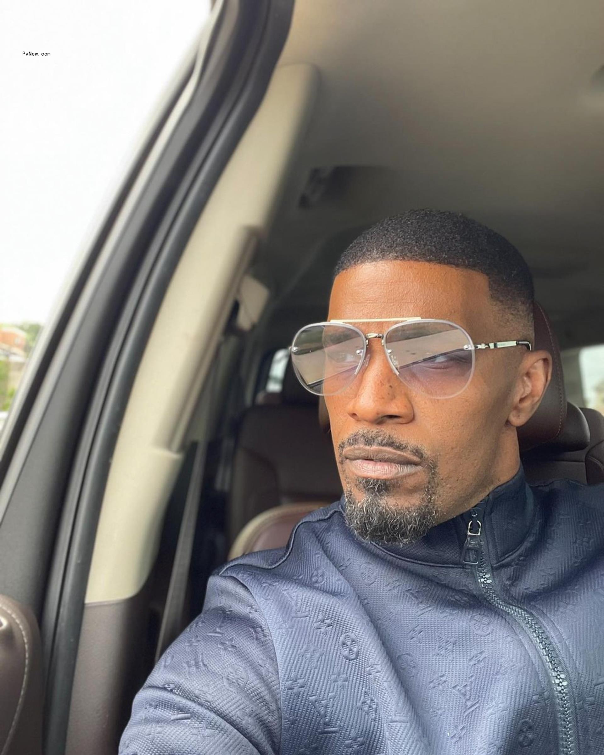 Jamie Foxx looking out of a car window.