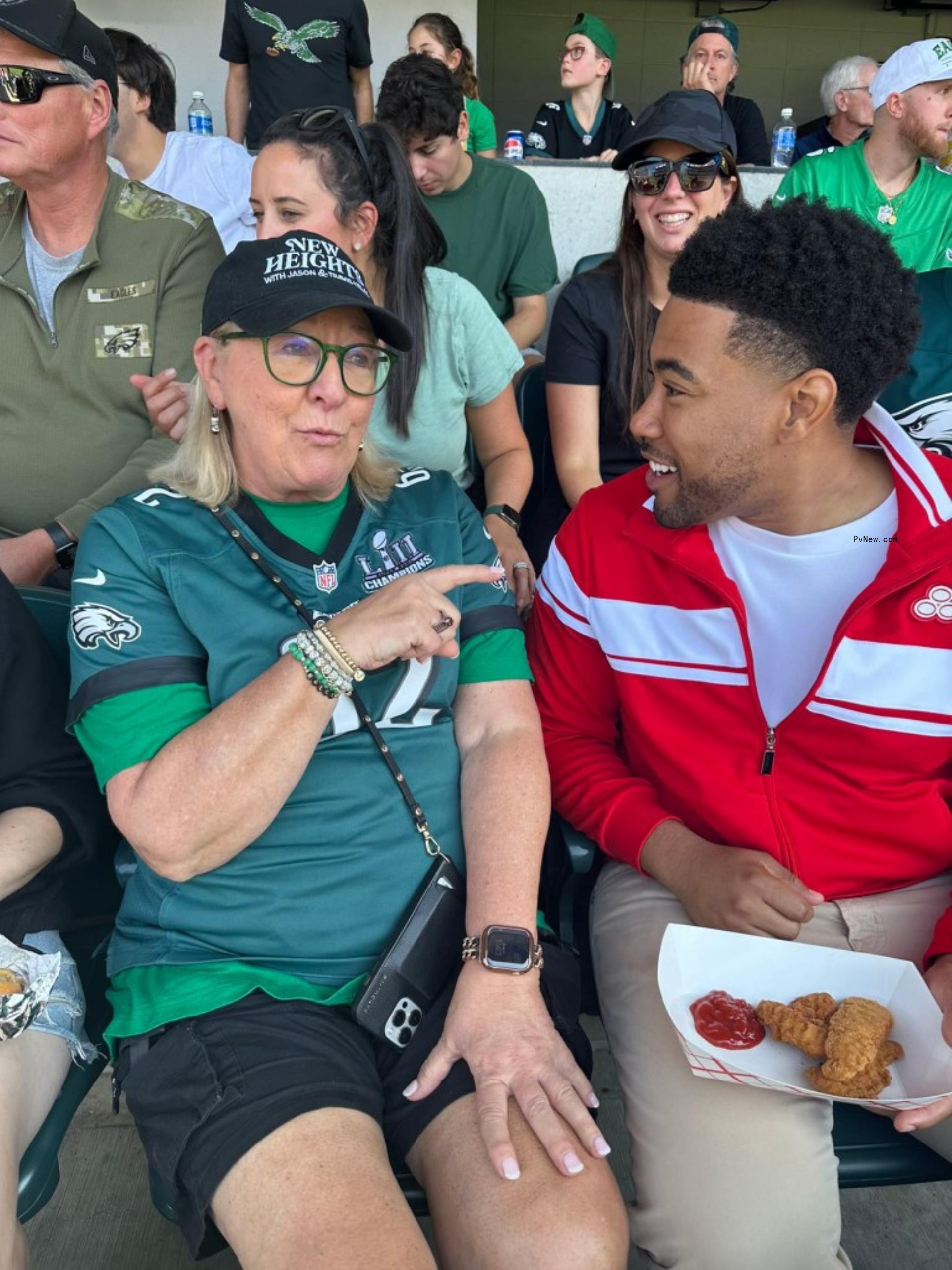 Do<i></i>nna Kelce and Jake from State Farm sit next to each other at Lincoln Financial Field
