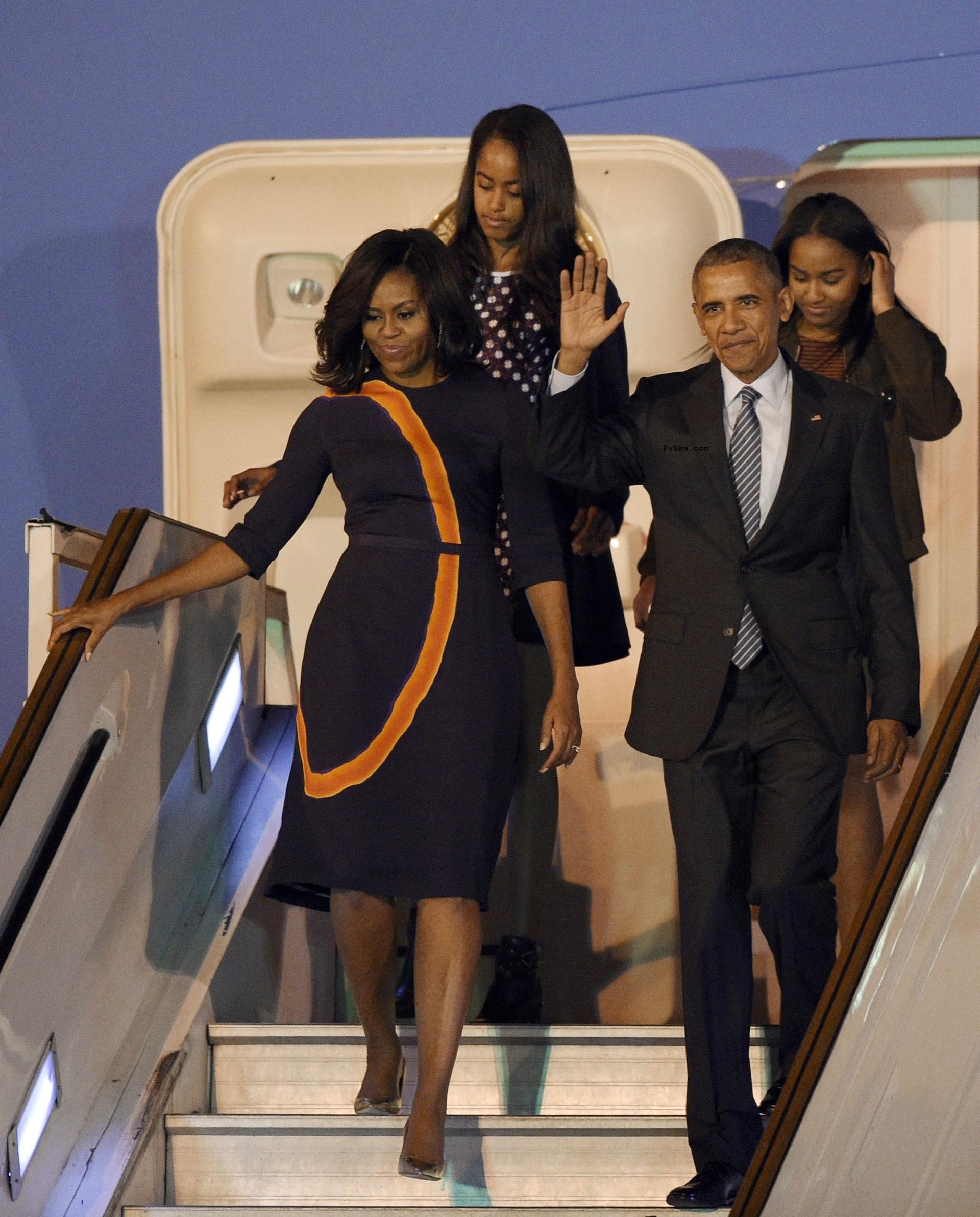 Barack and Michelle Obama with their daughters in 2016.