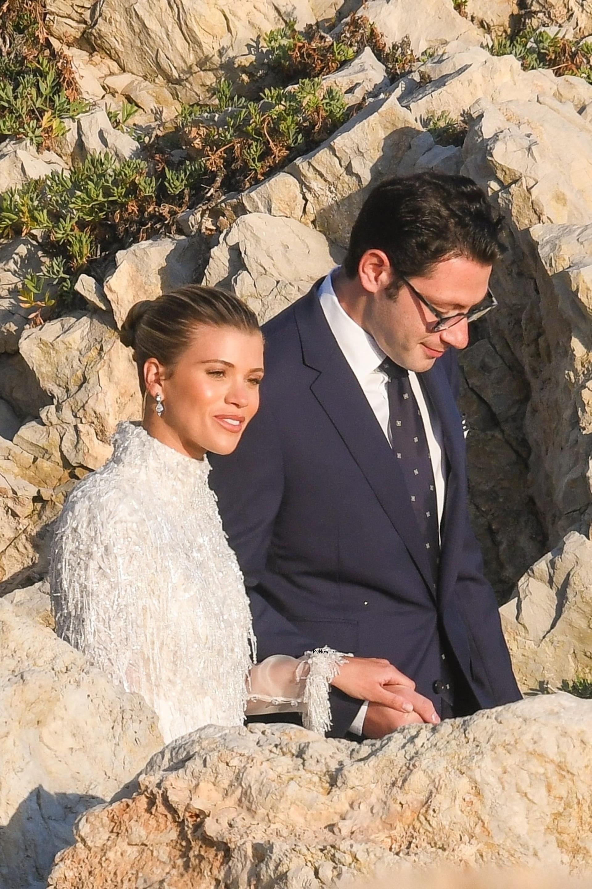 Sofia Richie and Elliot Grainge walking into their rehearsal dinner.