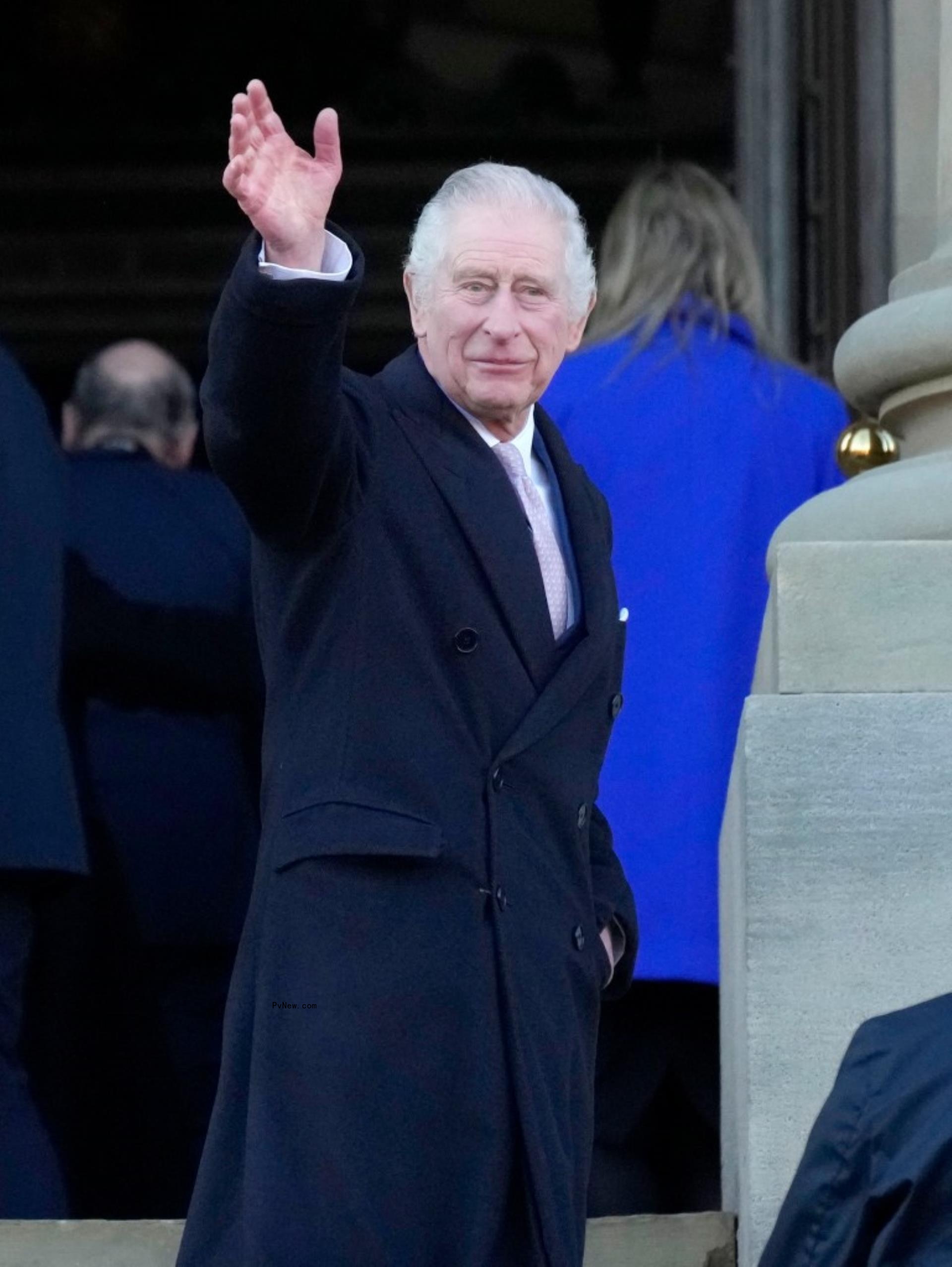 King Charles III waving.