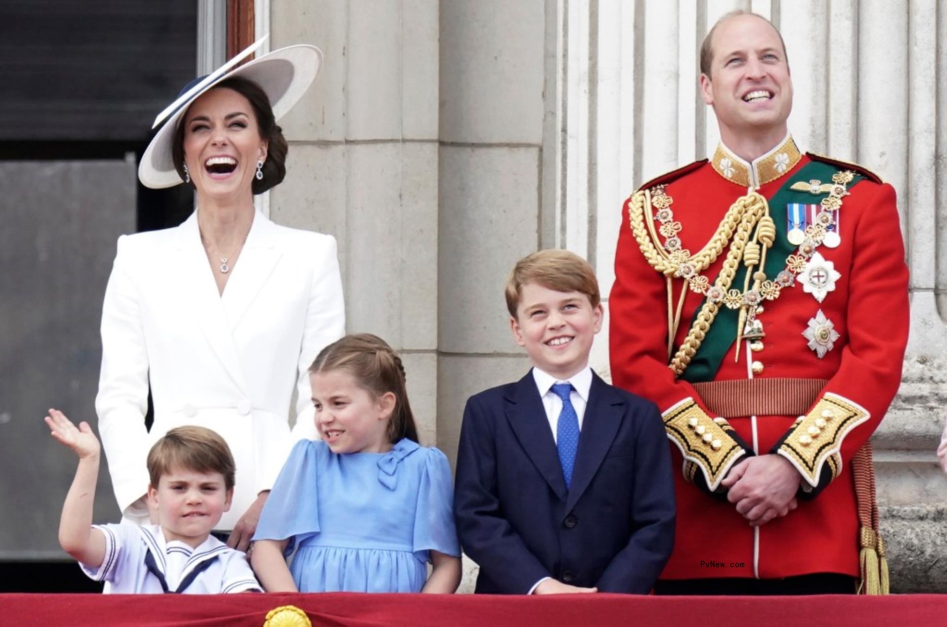 Prince William and Kate Middleton with their kids on the balcony of Buckingham Palace.