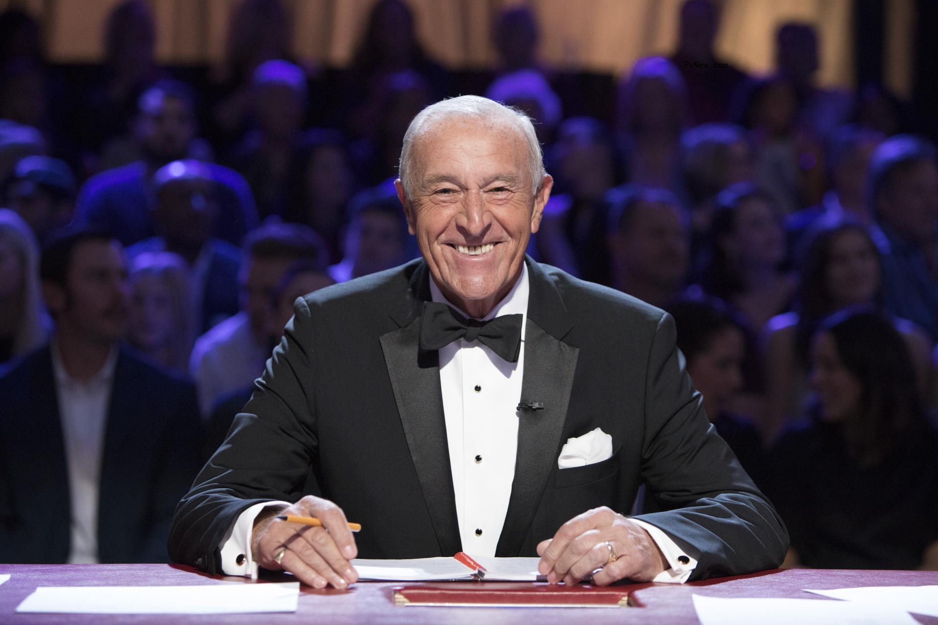 Len Goodman smiles in suit