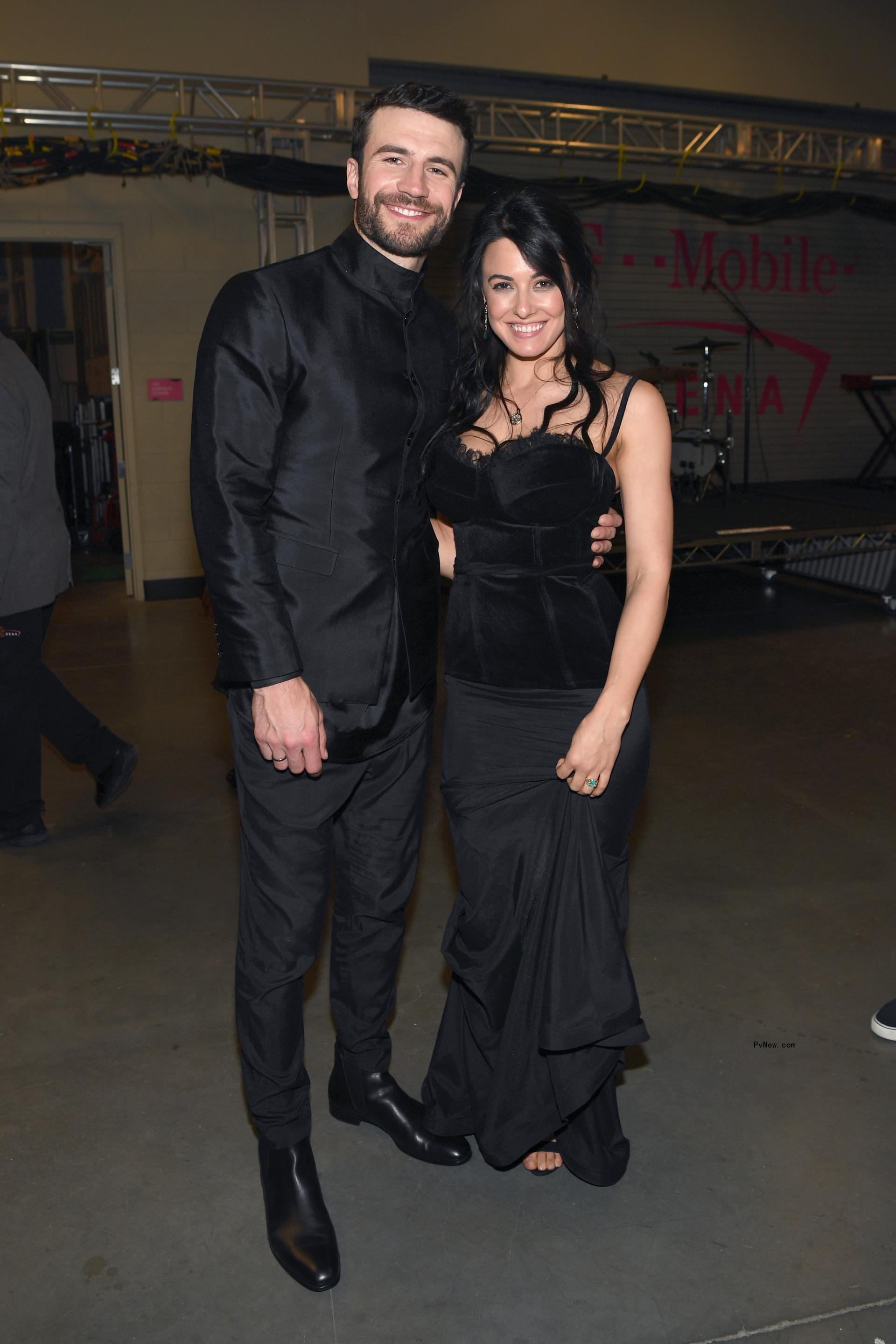 Sam Hunt and wife Hannah Lee Fowler sitting.