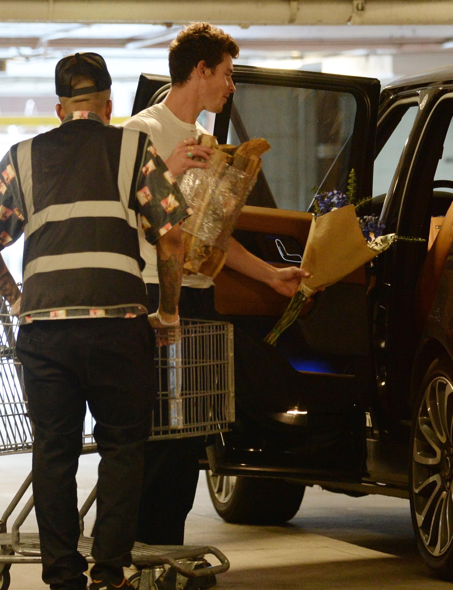 Shawn Mendes was seen picking up flowers.
