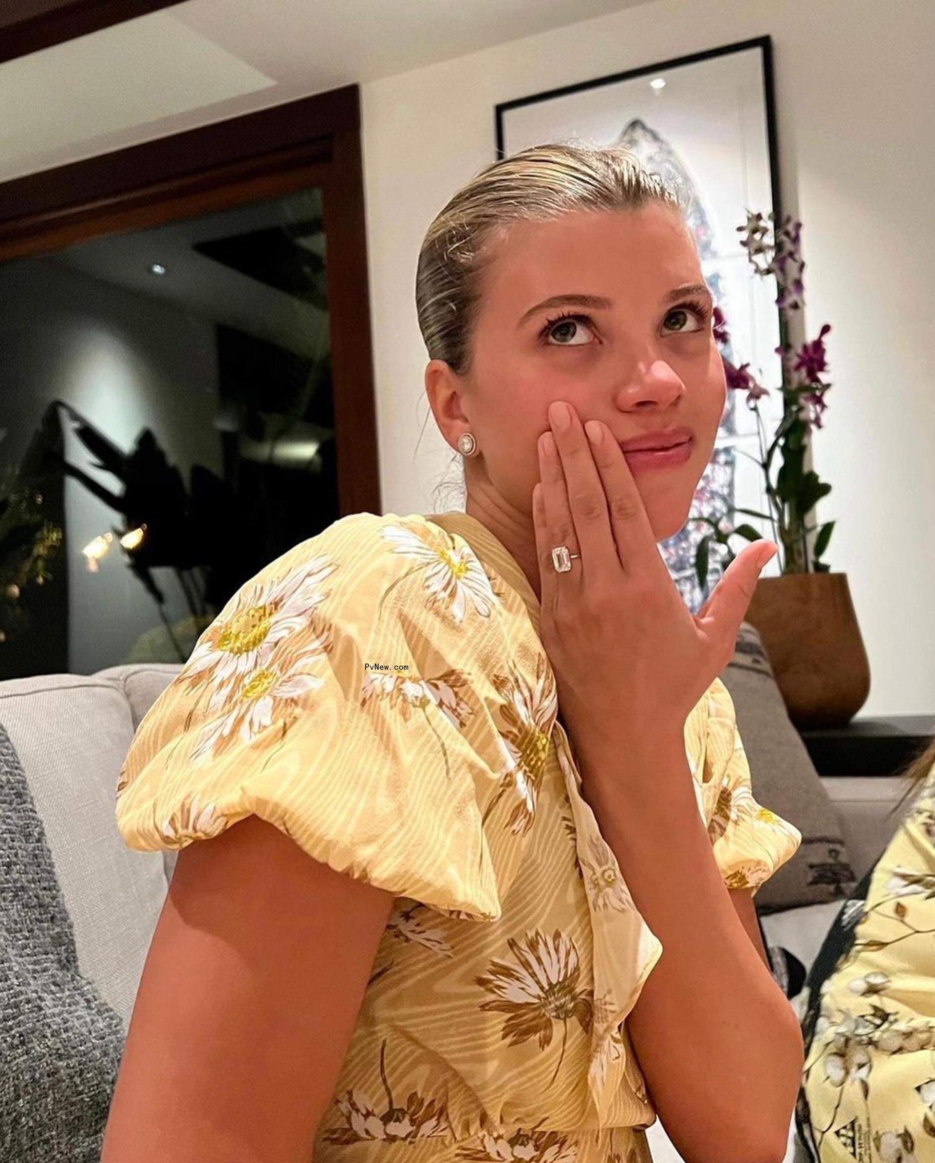 Sofia Richie showing off her engagement ring.