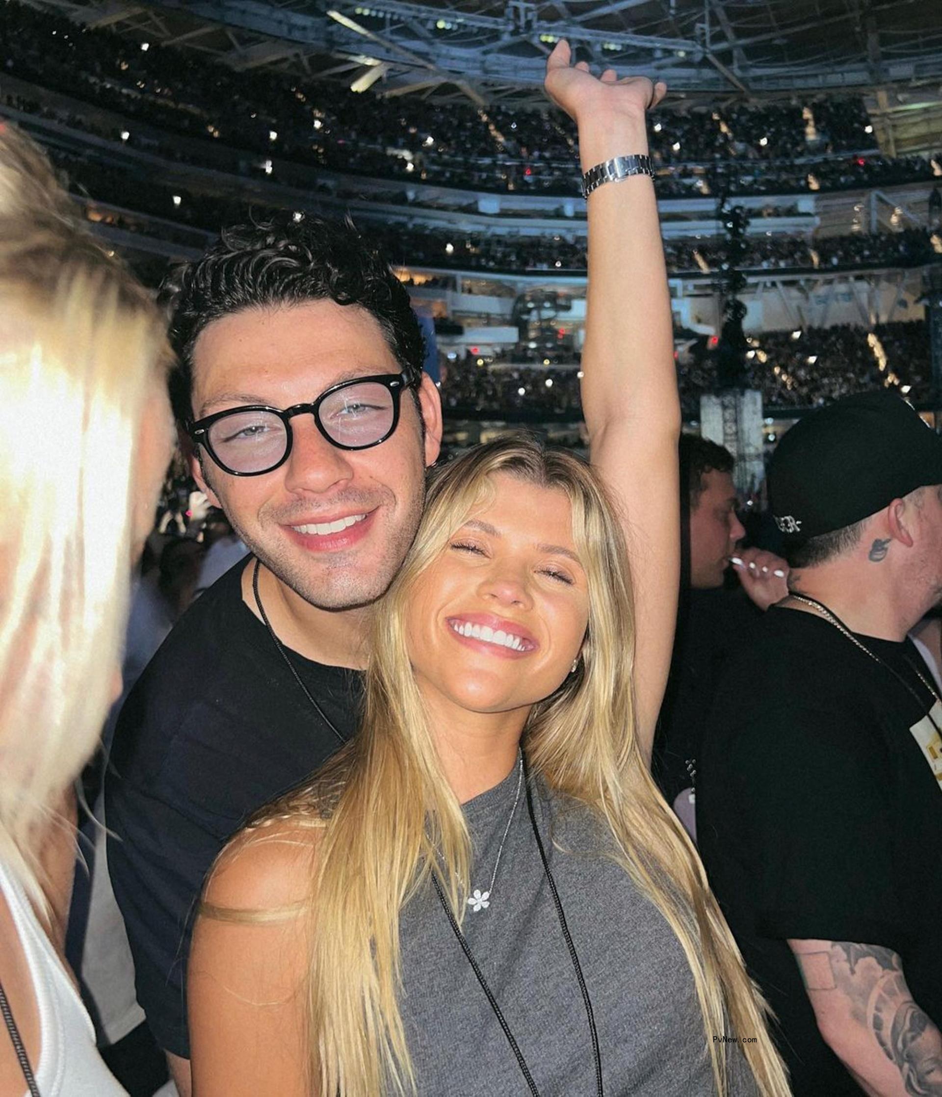 Sofia Richie and Elliot Grainge at a concert.
