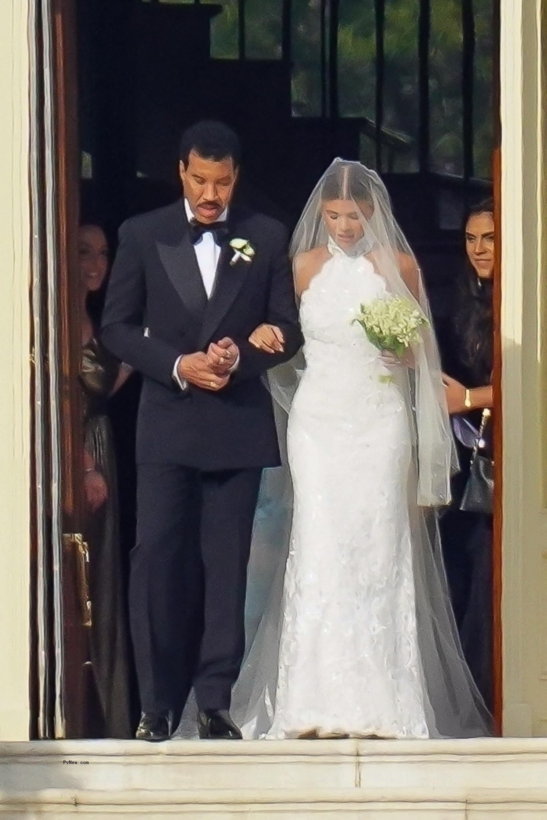 Sofia Richie walking down the aisle with Lio<i></i>nel Richie.