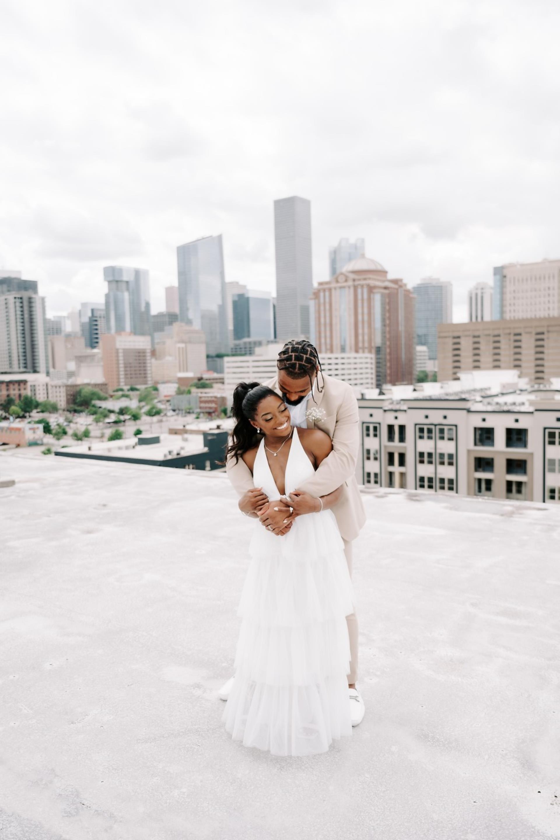 Simone Biles, Jo<i></i>nathan Owens