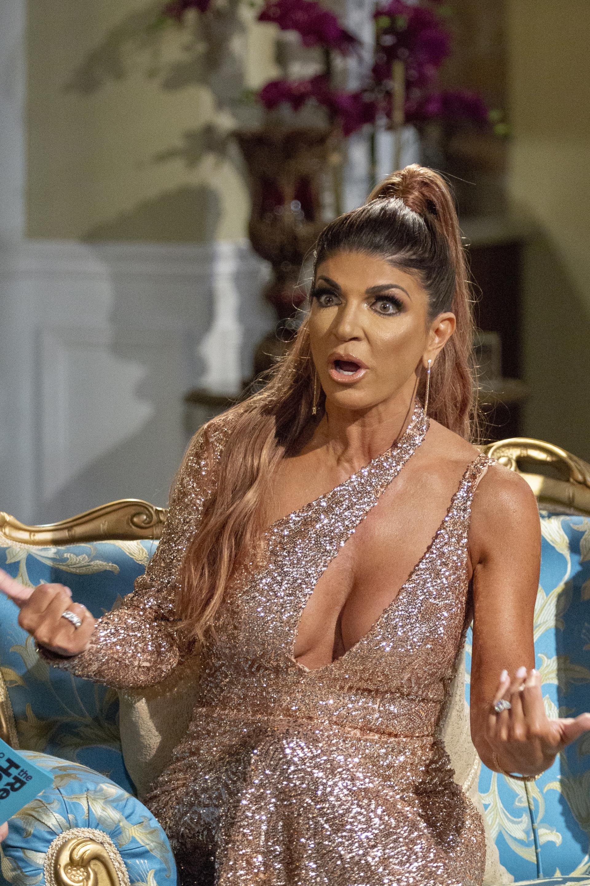 Teresa Giudice sitting on 