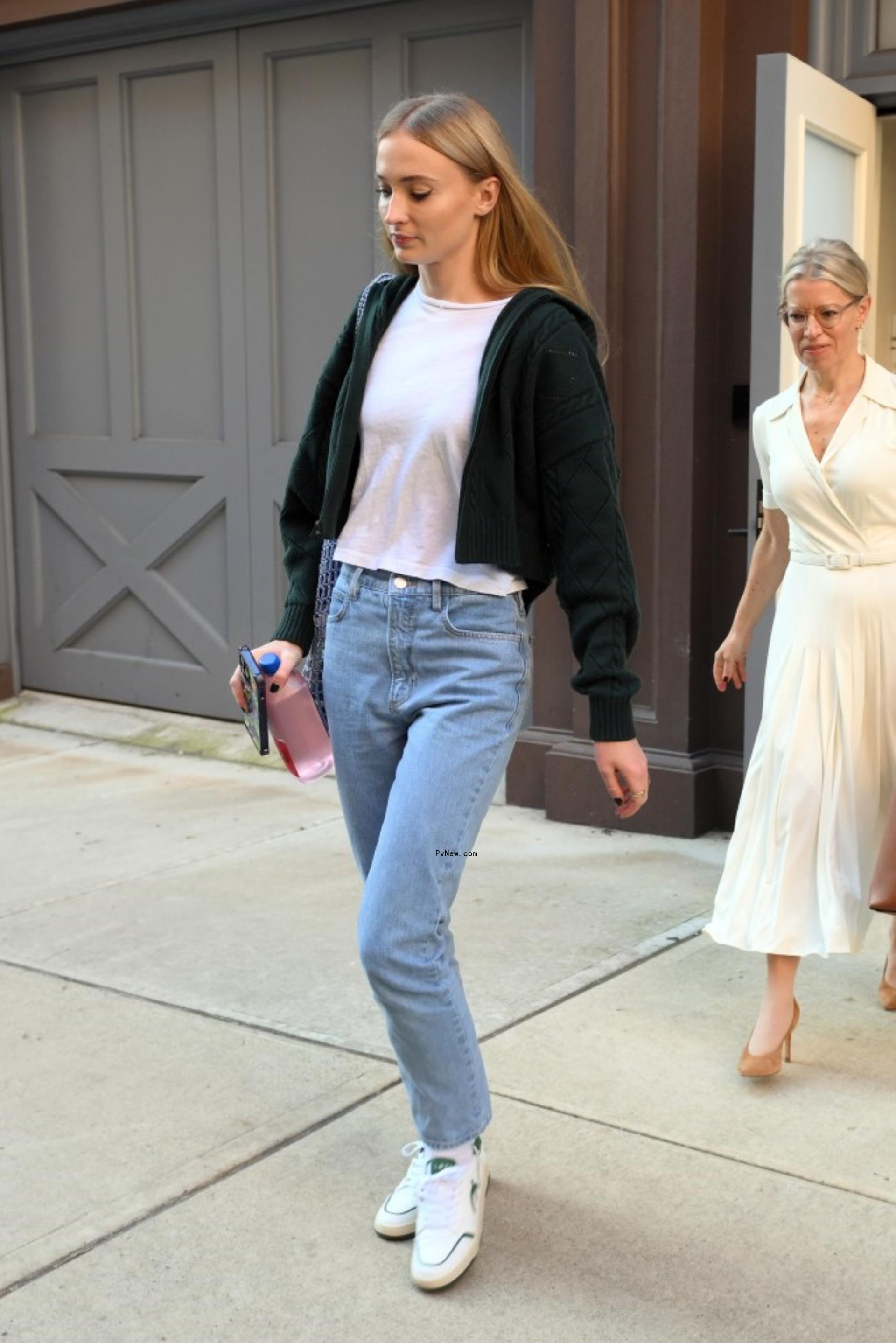 Sophie Turner walking.