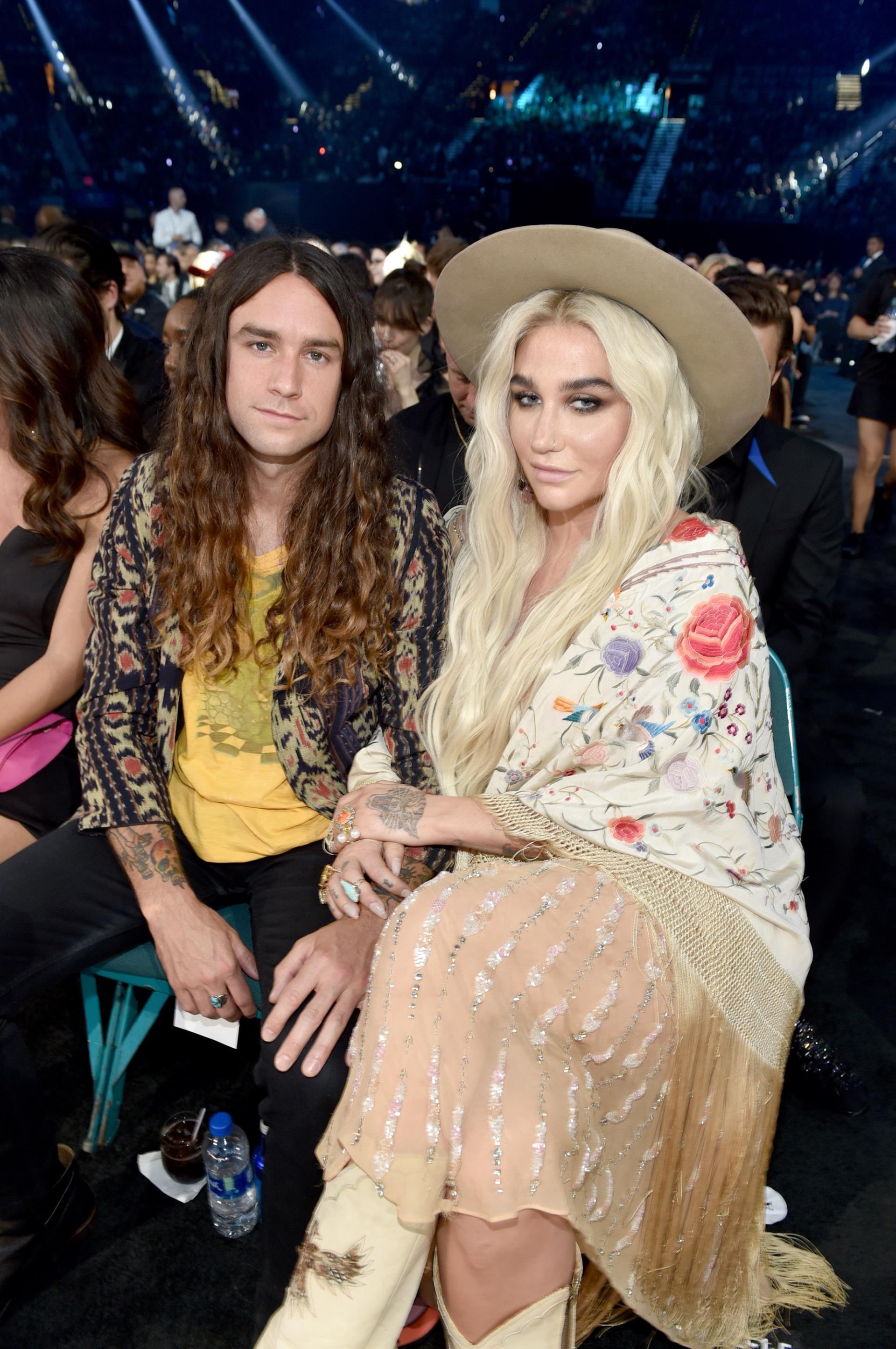 Kesha and Brad Ashenfelter at an event together.