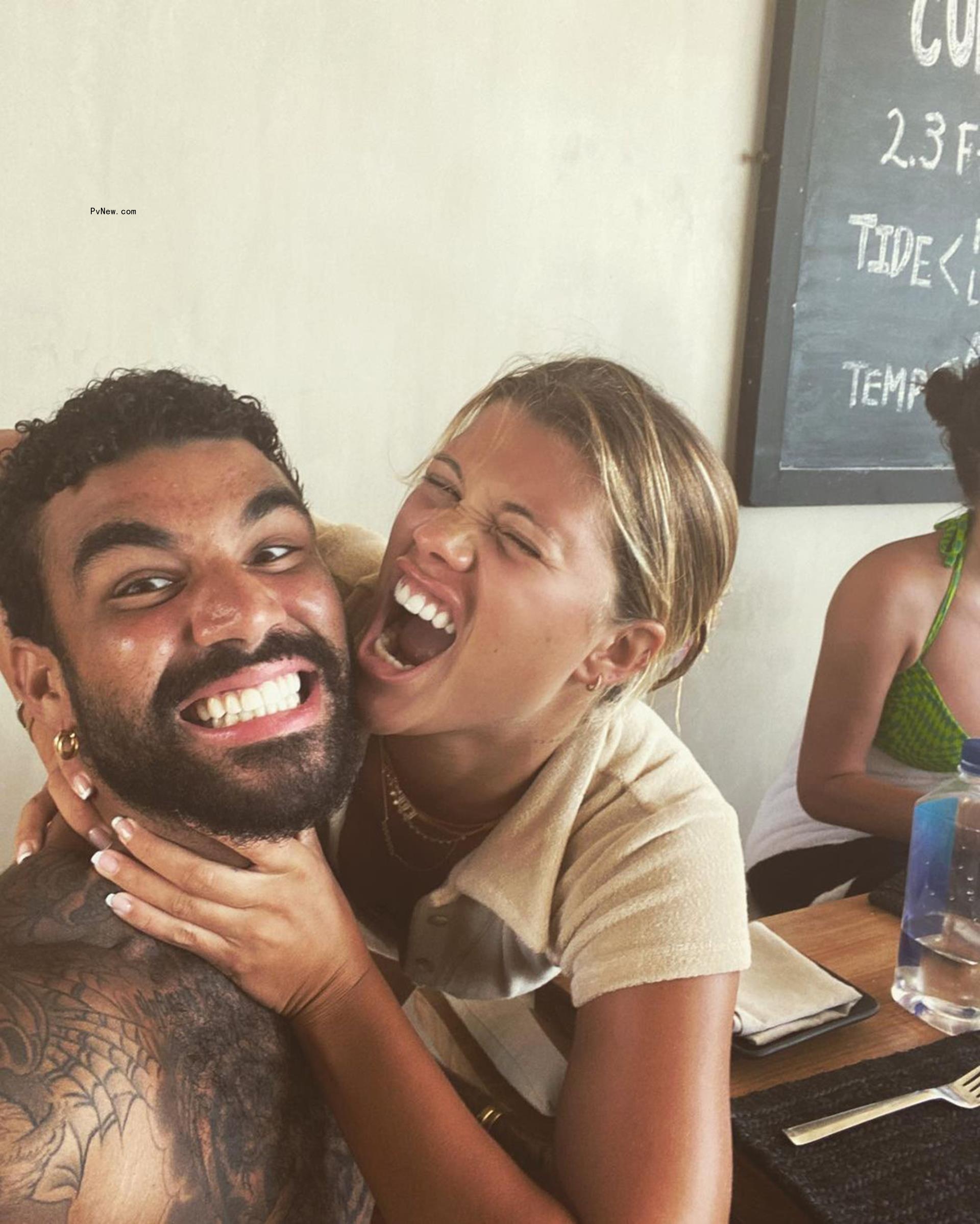 Sofia Richie pretends to choke Miles Richie