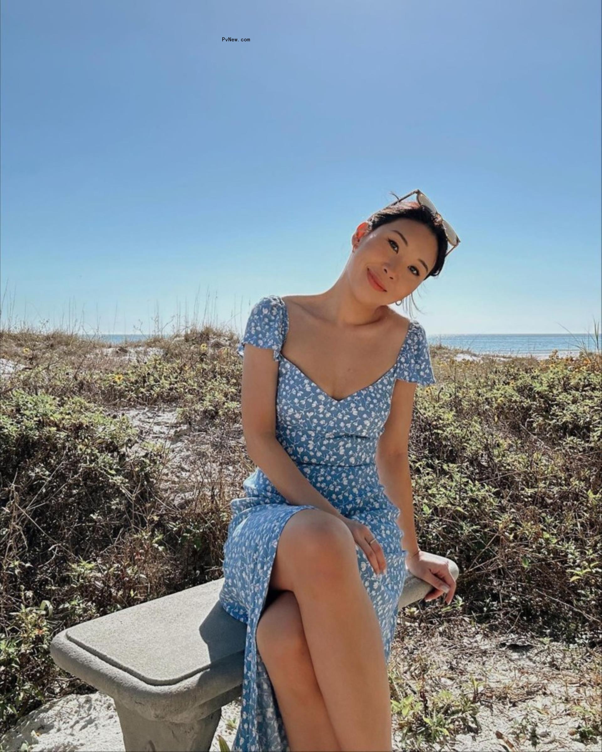 Natalie Lee in a blue dress. 