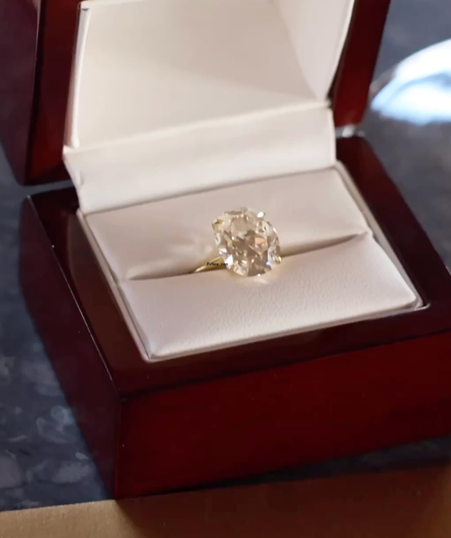 A photo of Alex Cooper's engagement ring by Jenna Blake