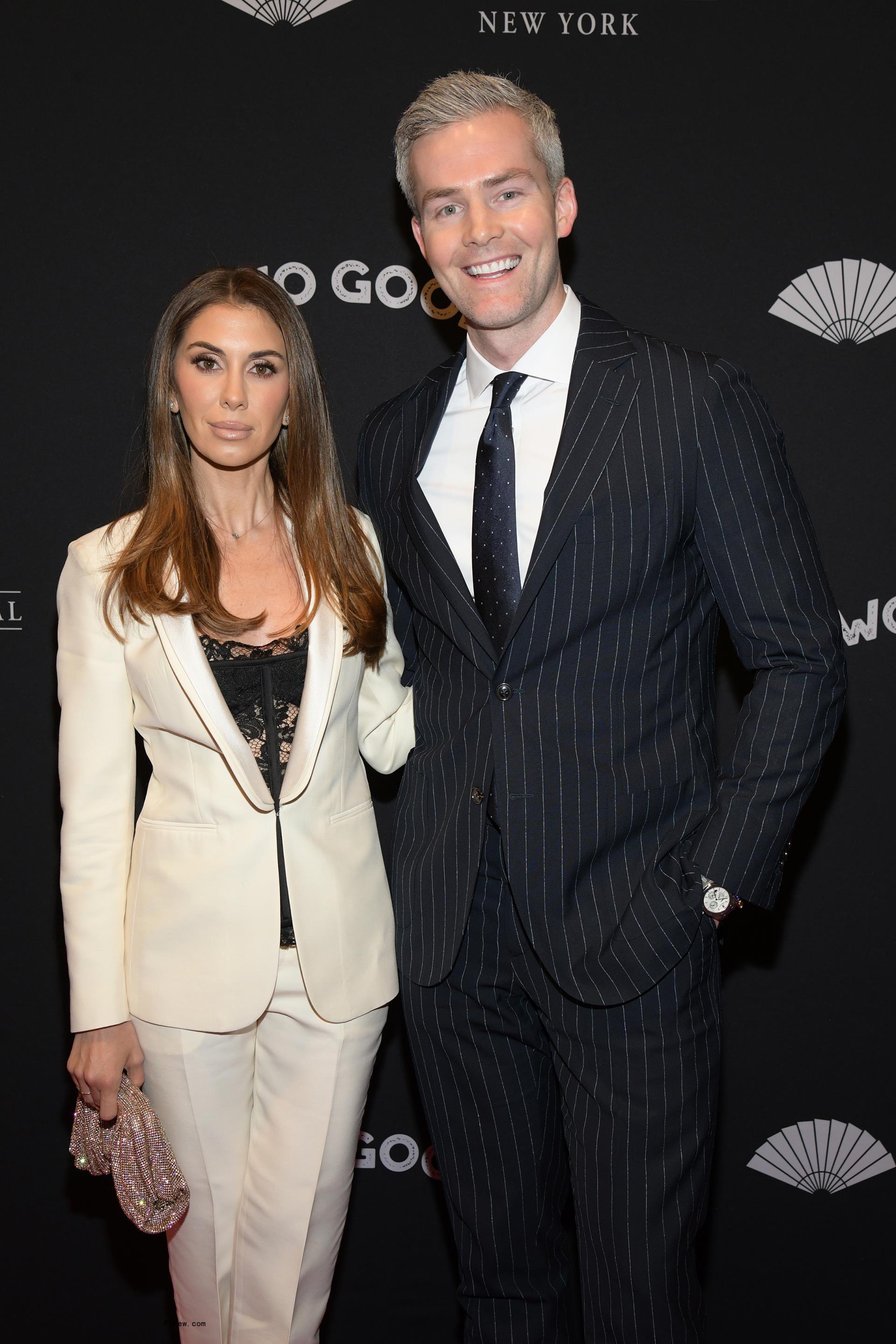 Emilia Bechrakis and Ryan Serhant posing for a photo together