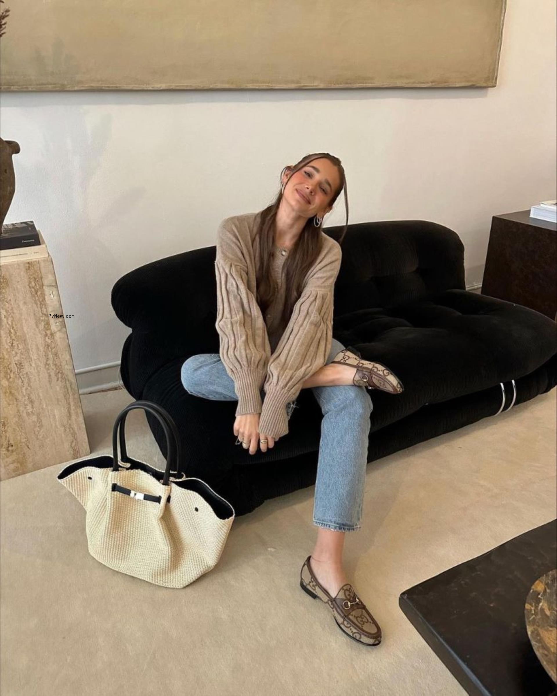 Danielle Bernstein on a couch.