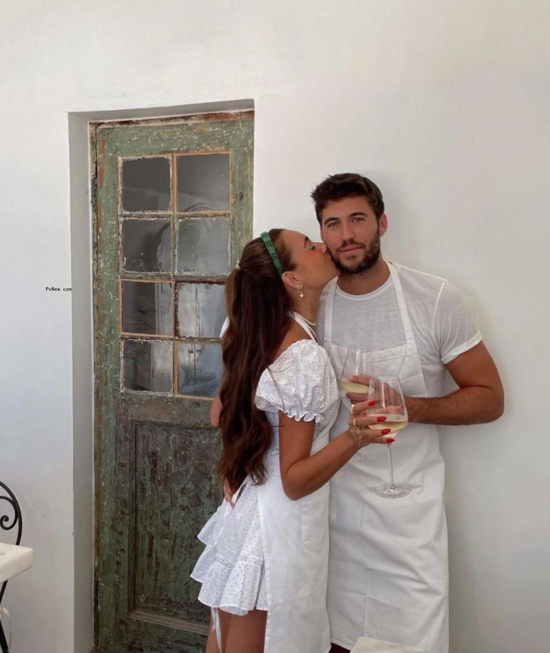 Danielle Bernstein kissing Anthony Adler.