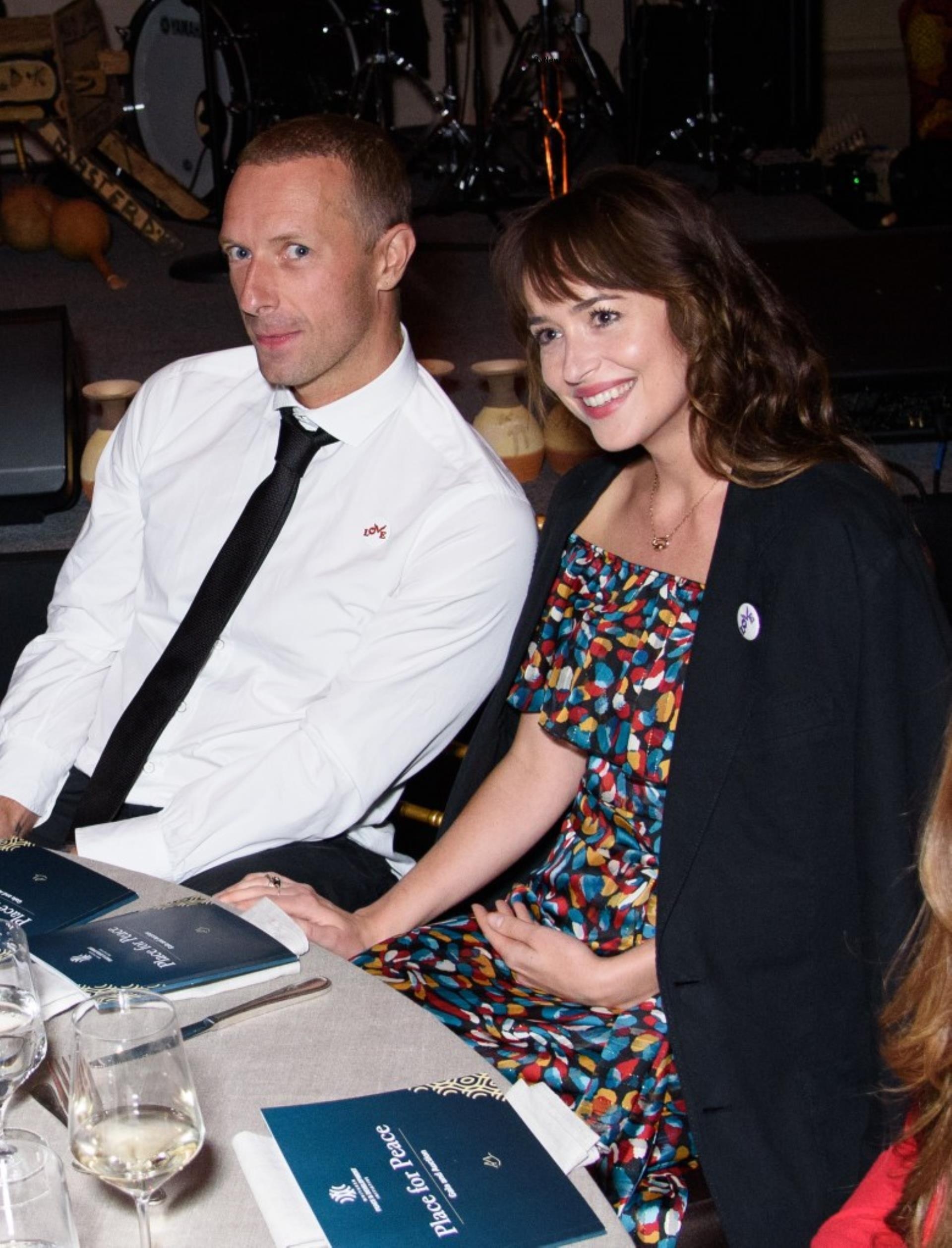 Chris MArtin and Dakota Johnson. 