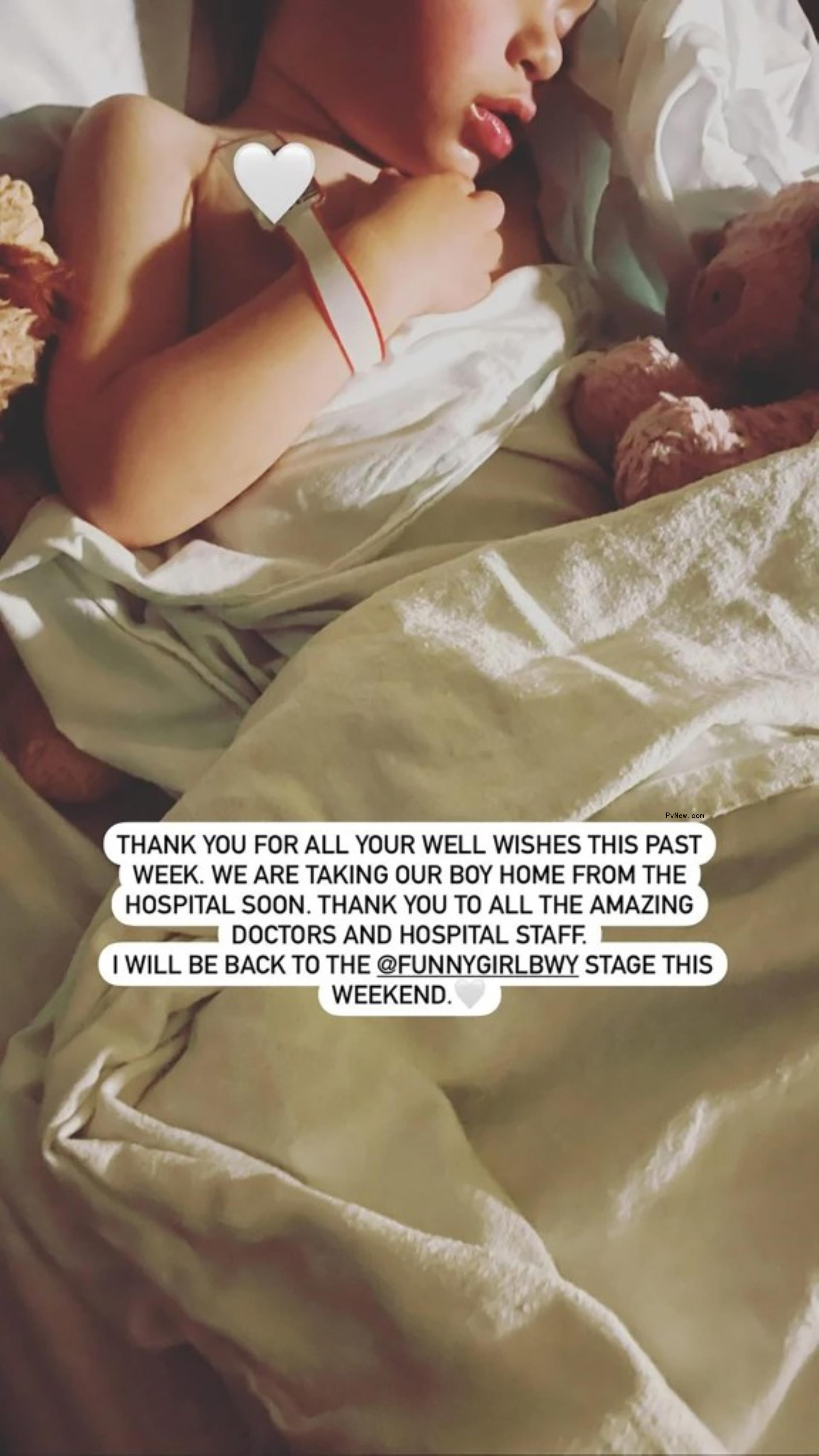 Lea Michele holding her son Ever.